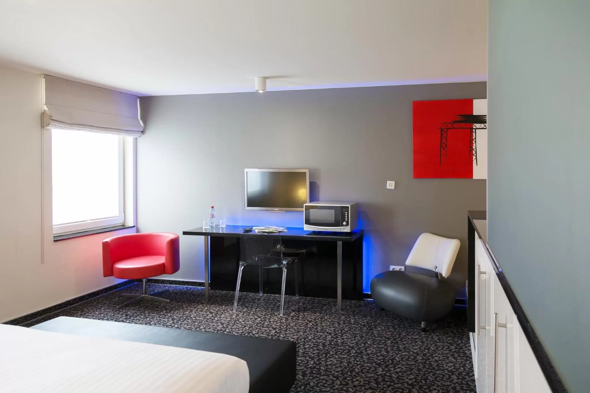 Seating area, Bed in Hotel Tristar