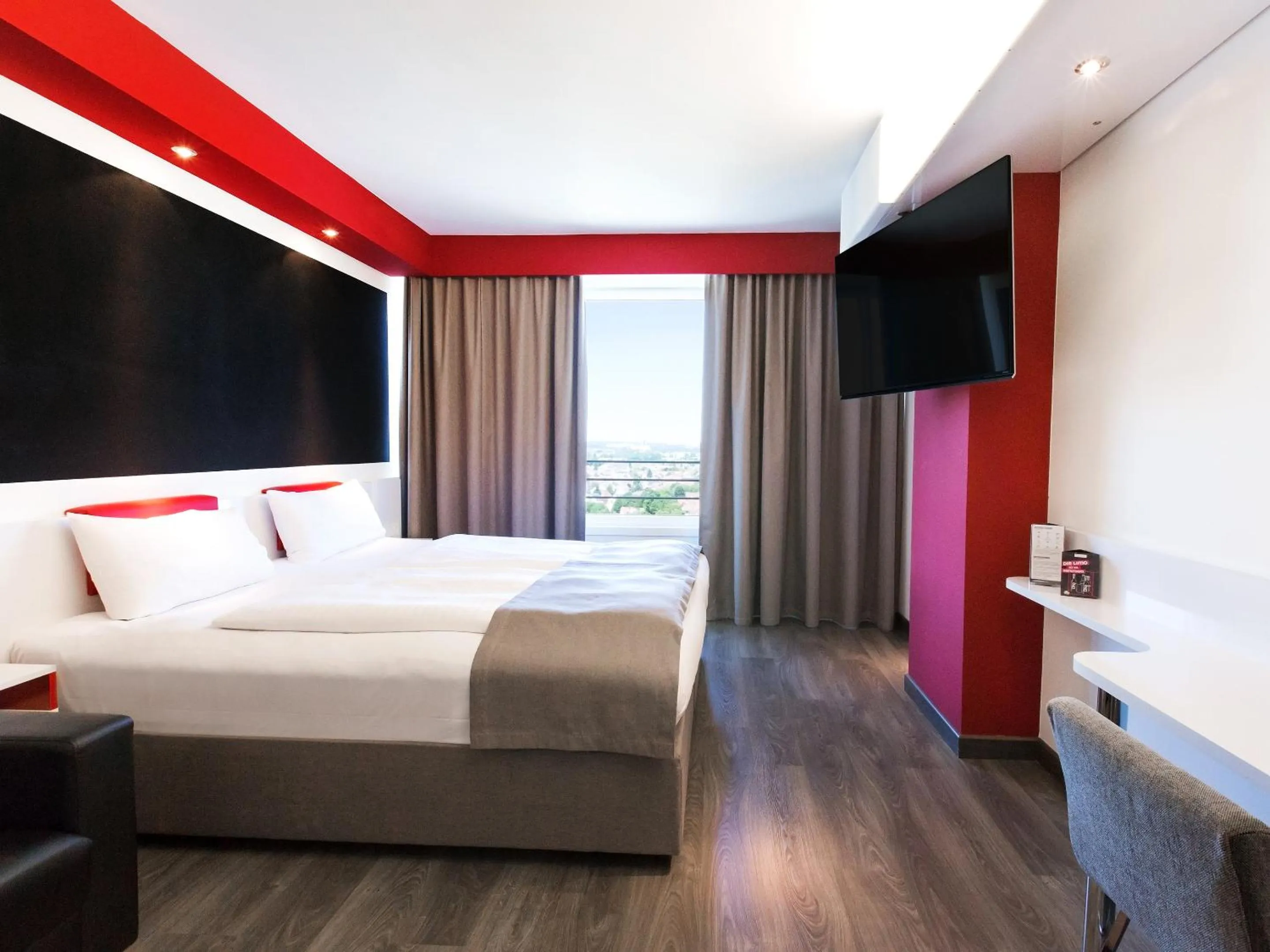 Photo of the whole room, Bed in DORMERO Hotel Stuttgart