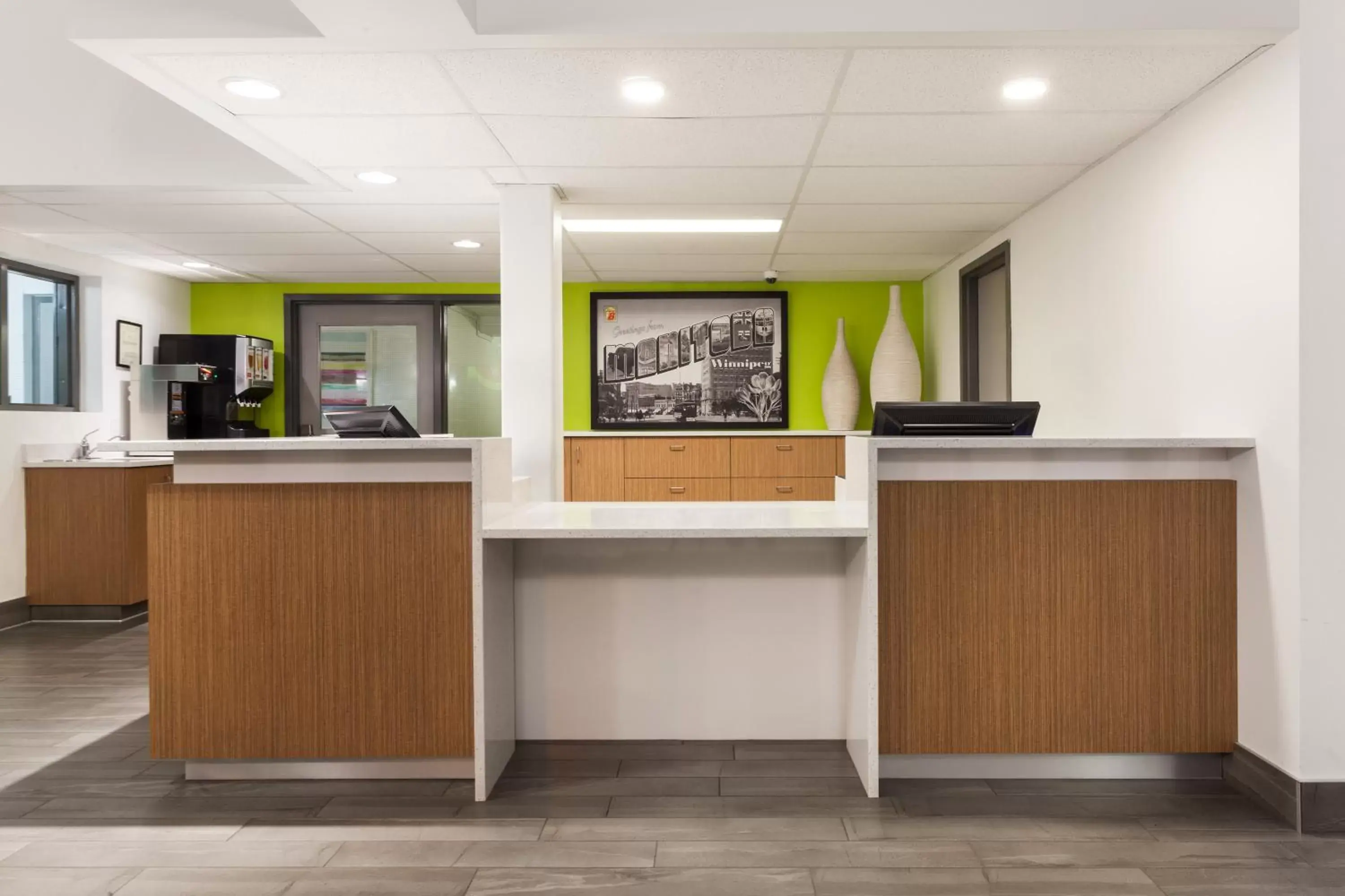 Lobby or reception in Super 8 by Wyndham Winnipeg West Lobby or reception in Super 8 by Wyndham Winnipeg West