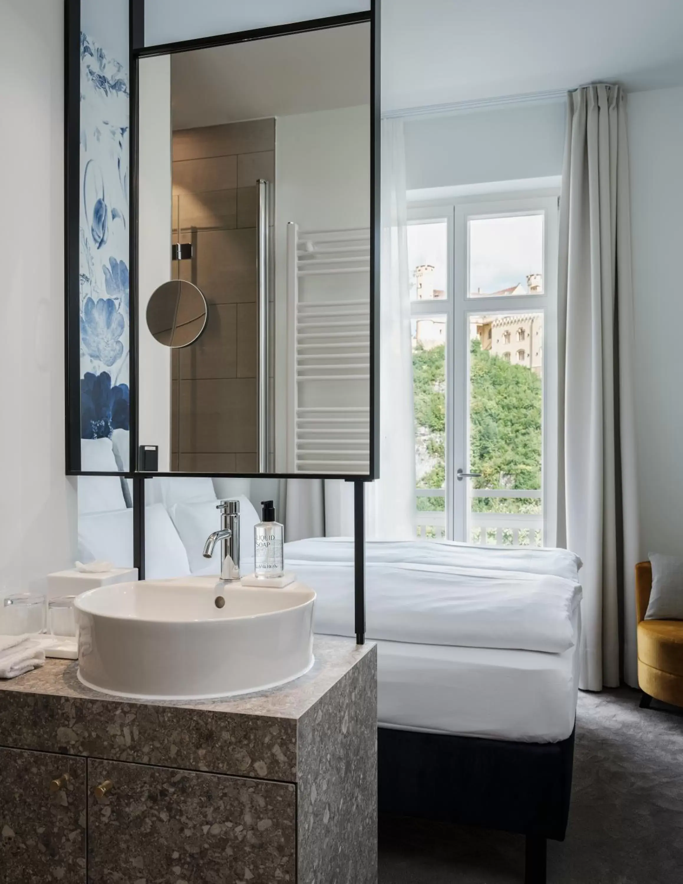 Bathroom, Bed in AMERON Neuschwanstein Alpsee Resort & Spa Bathroom, Bed in AMERON Neuschwanstein Alpsee Resort & Spa