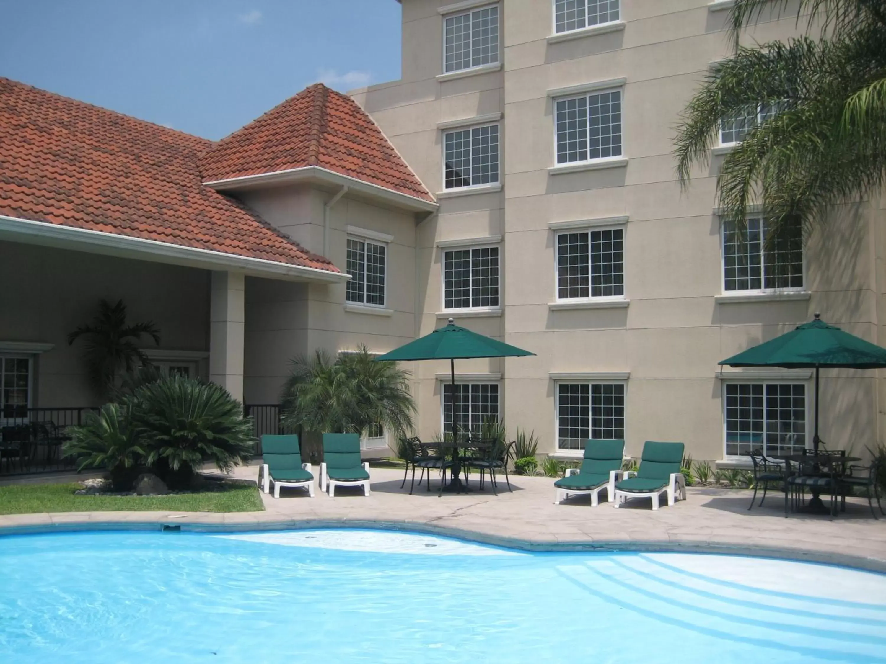 Swimming pool, Property Building in Staybridge Suites Monterrey San Pedro, an IHG Hotel