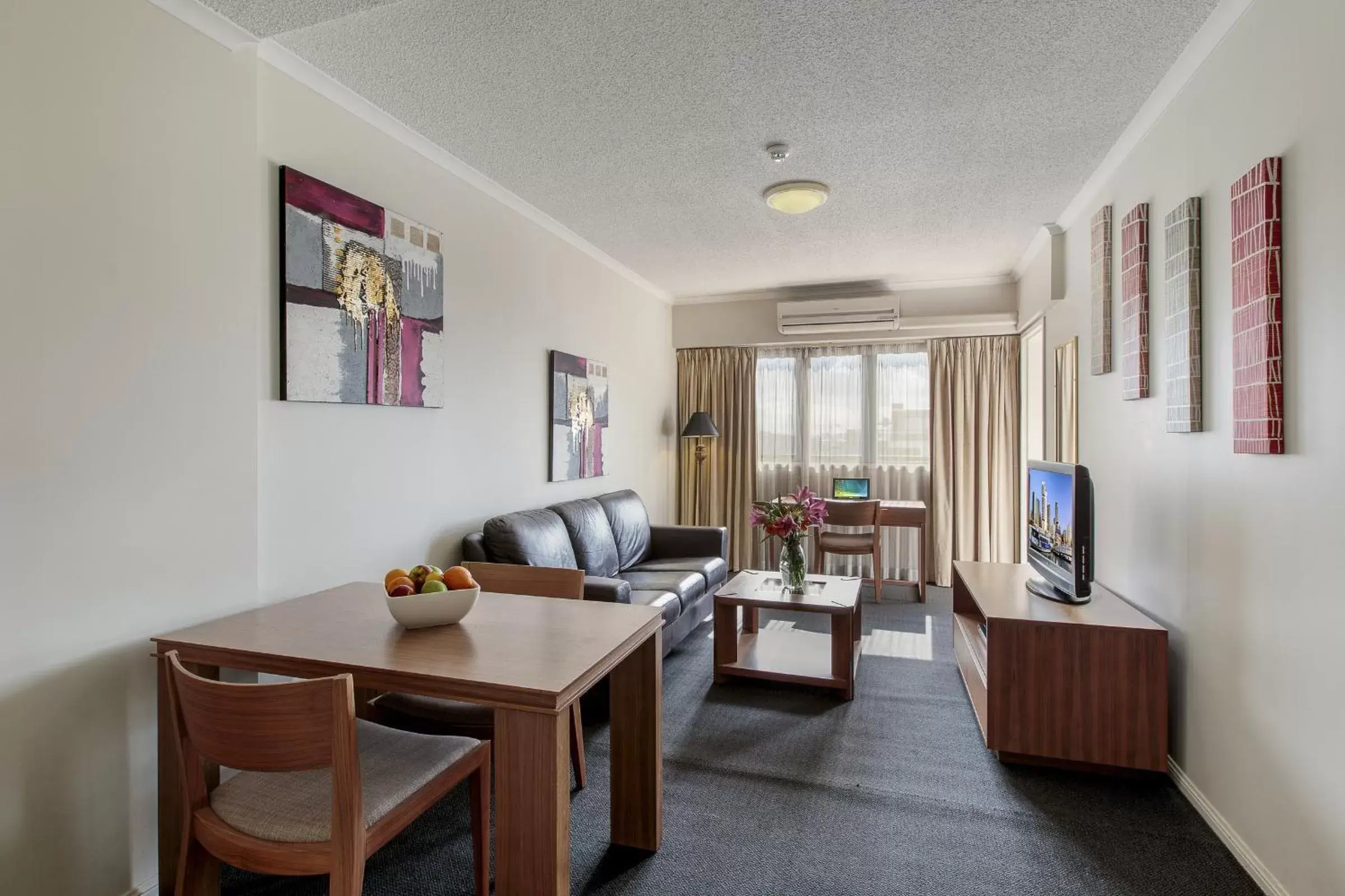 Photo of the whole room, Seating Area in Central Brunswick Apartment Hotel