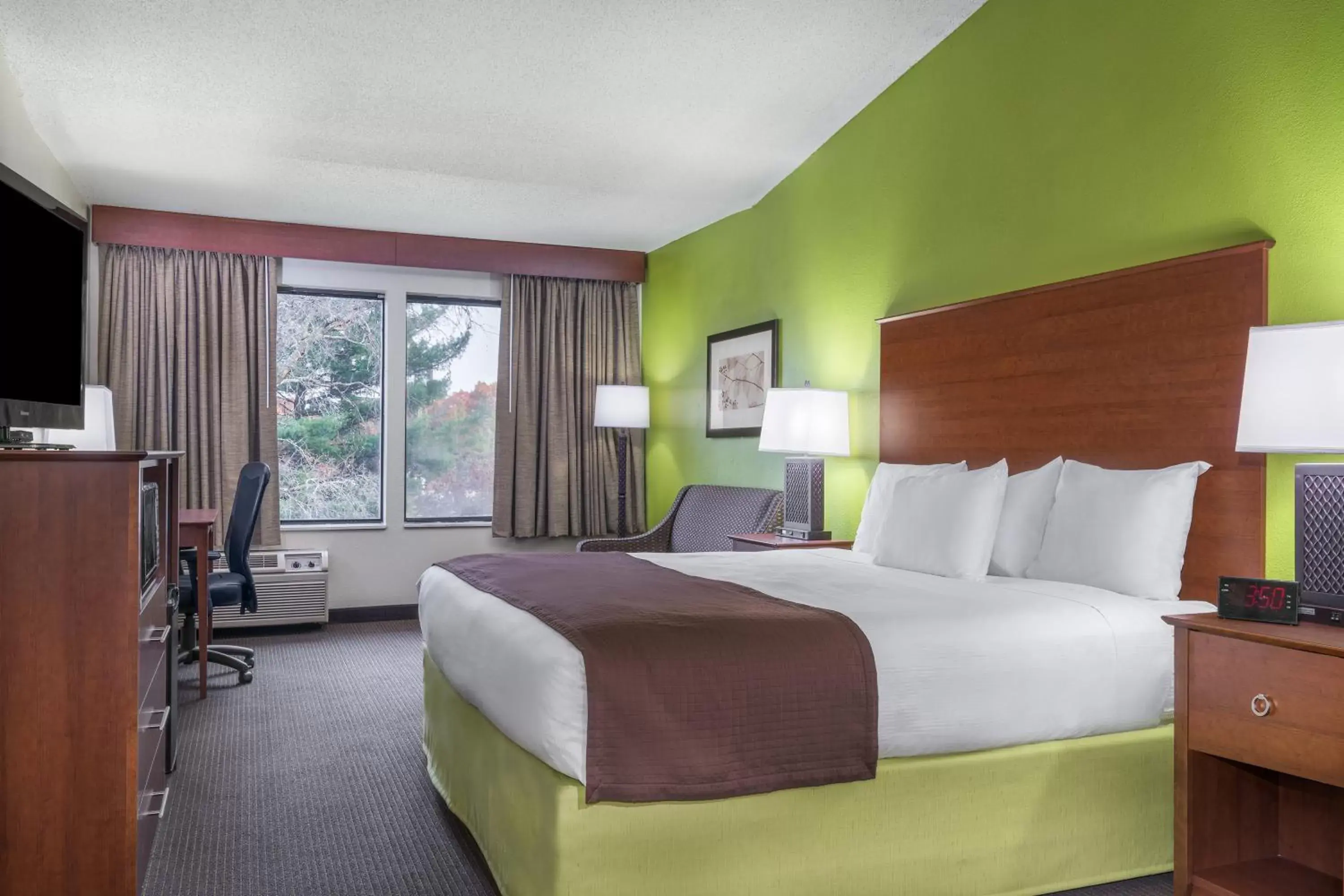 Photo of the whole room, Bed in AmericInn by Wyndham Black River Falls I-94 on ATV Trail