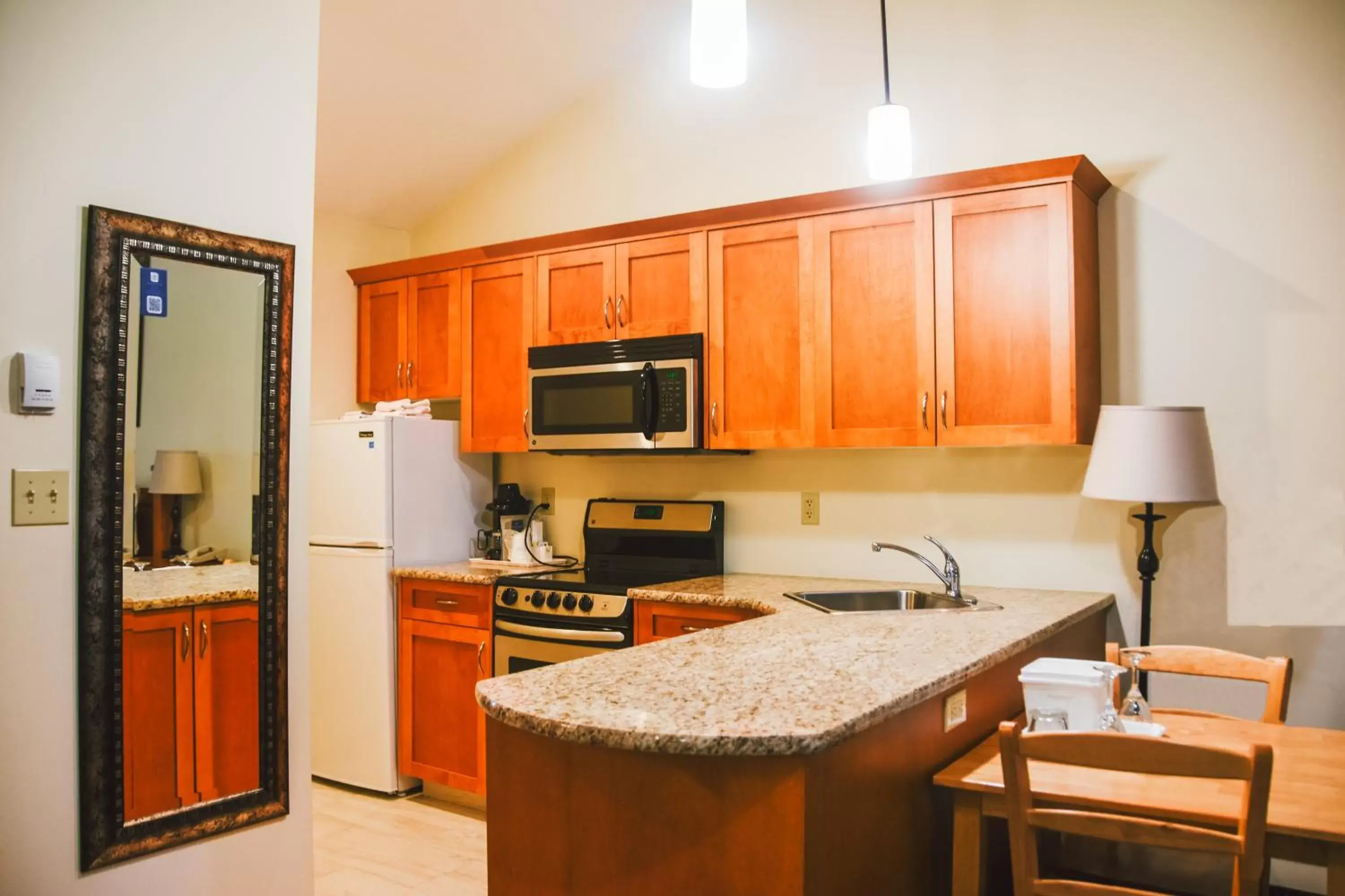 Photo of the whole room, Kitchen/Kitchenette in Stony Plain Inn & Suites