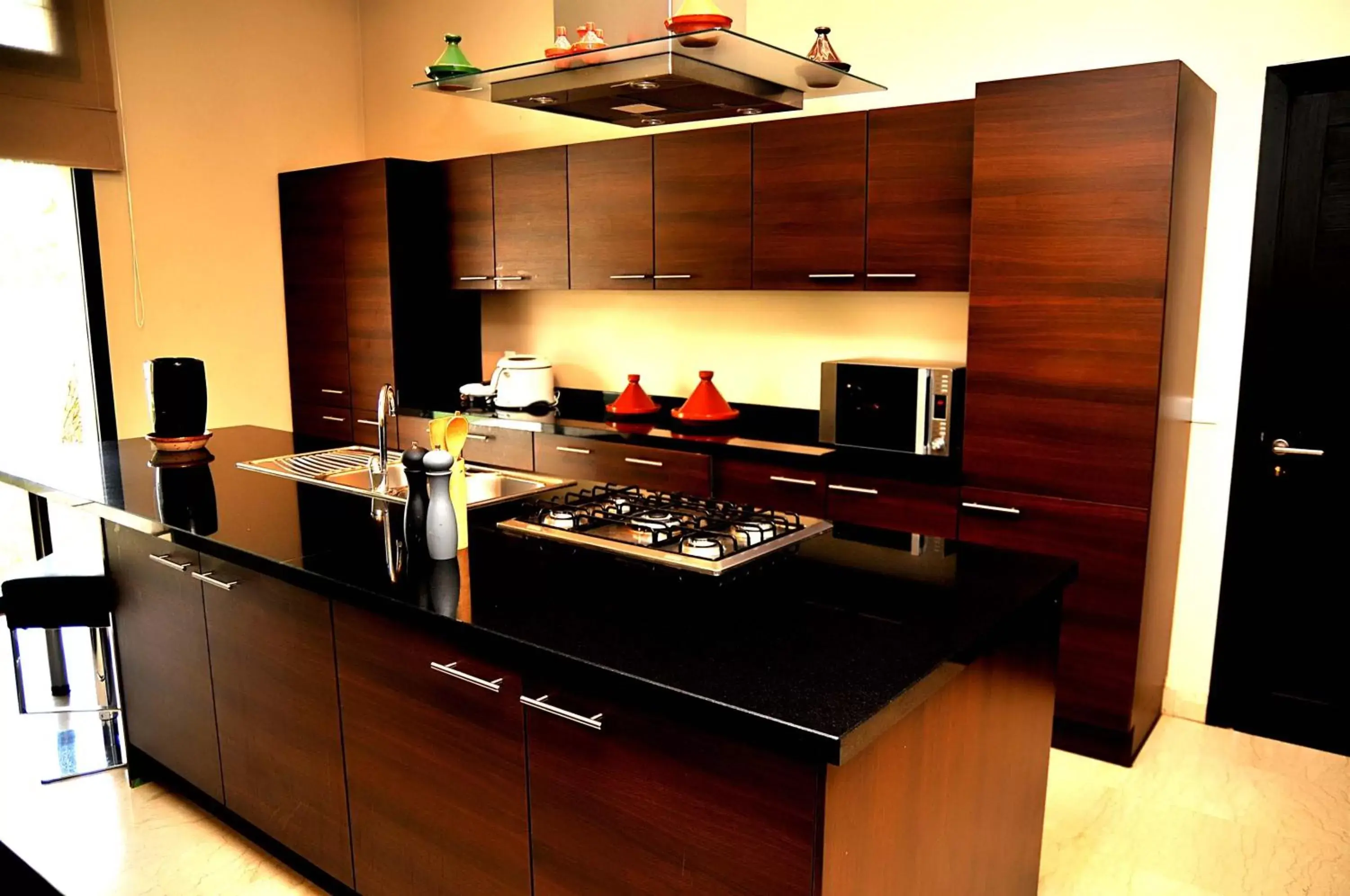 Kitchen or kitchenette, Kitchen/Kitchenette in Al Maaden Villa Hotel & Spa