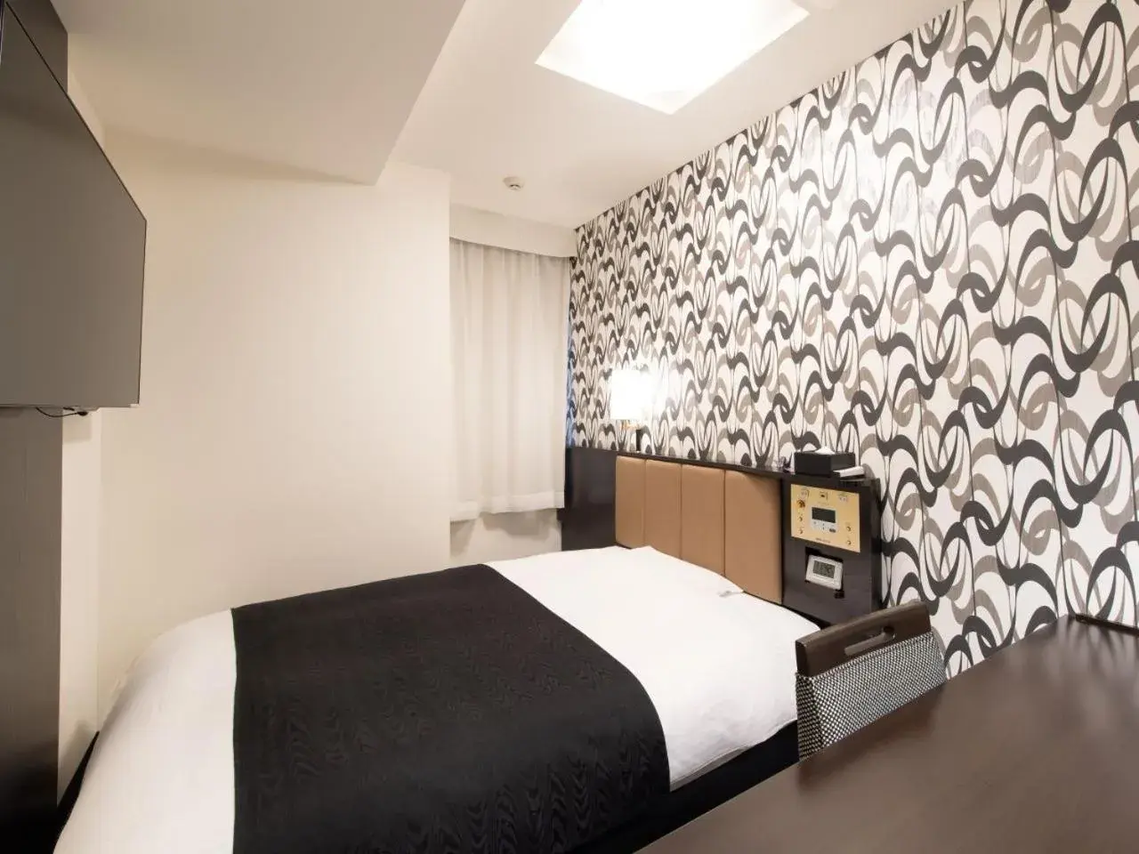 Bed in APA Hotel TKP Tokyo Nishikasai