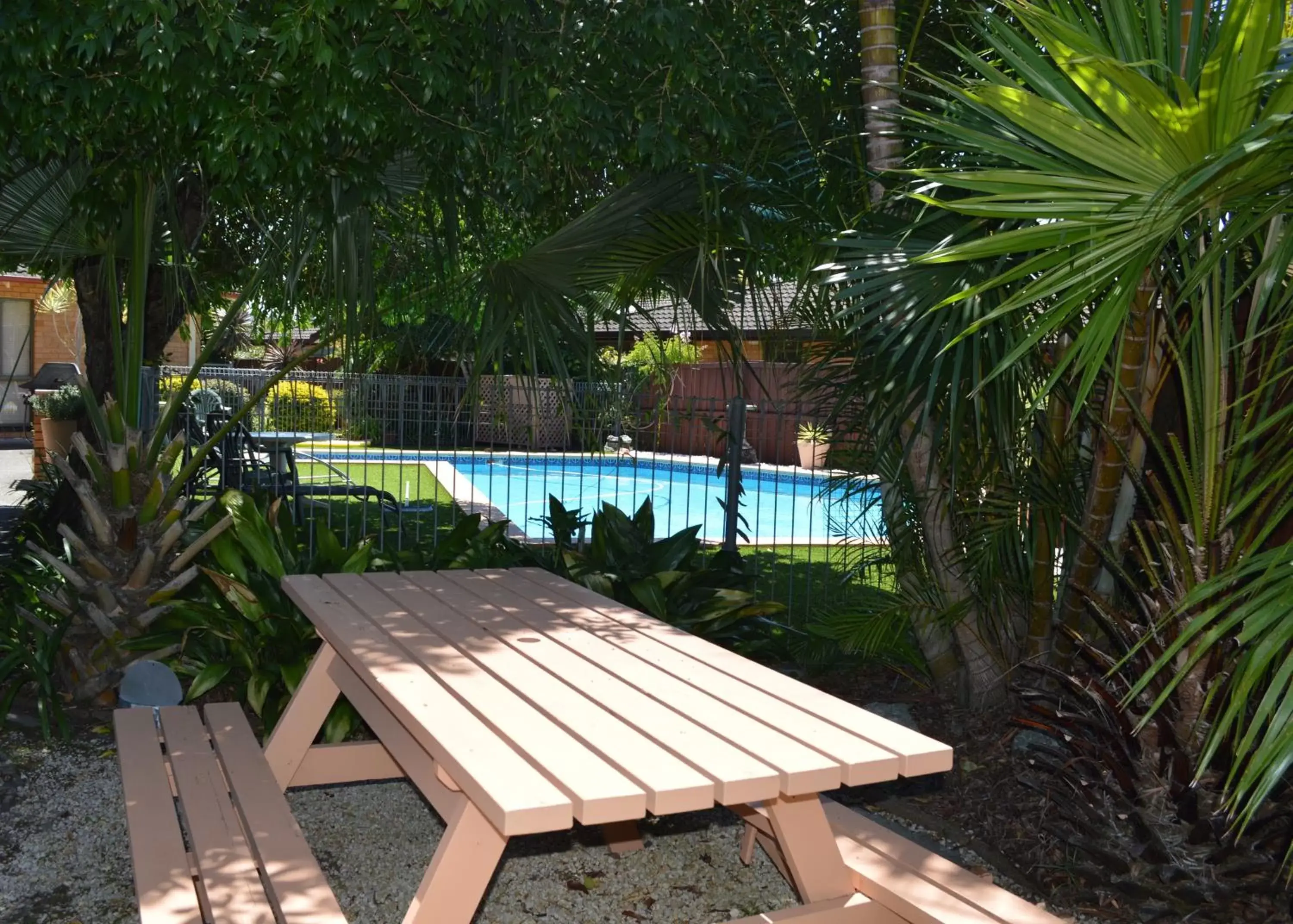 Patio, Swimming Pool in Port O'Call Motel