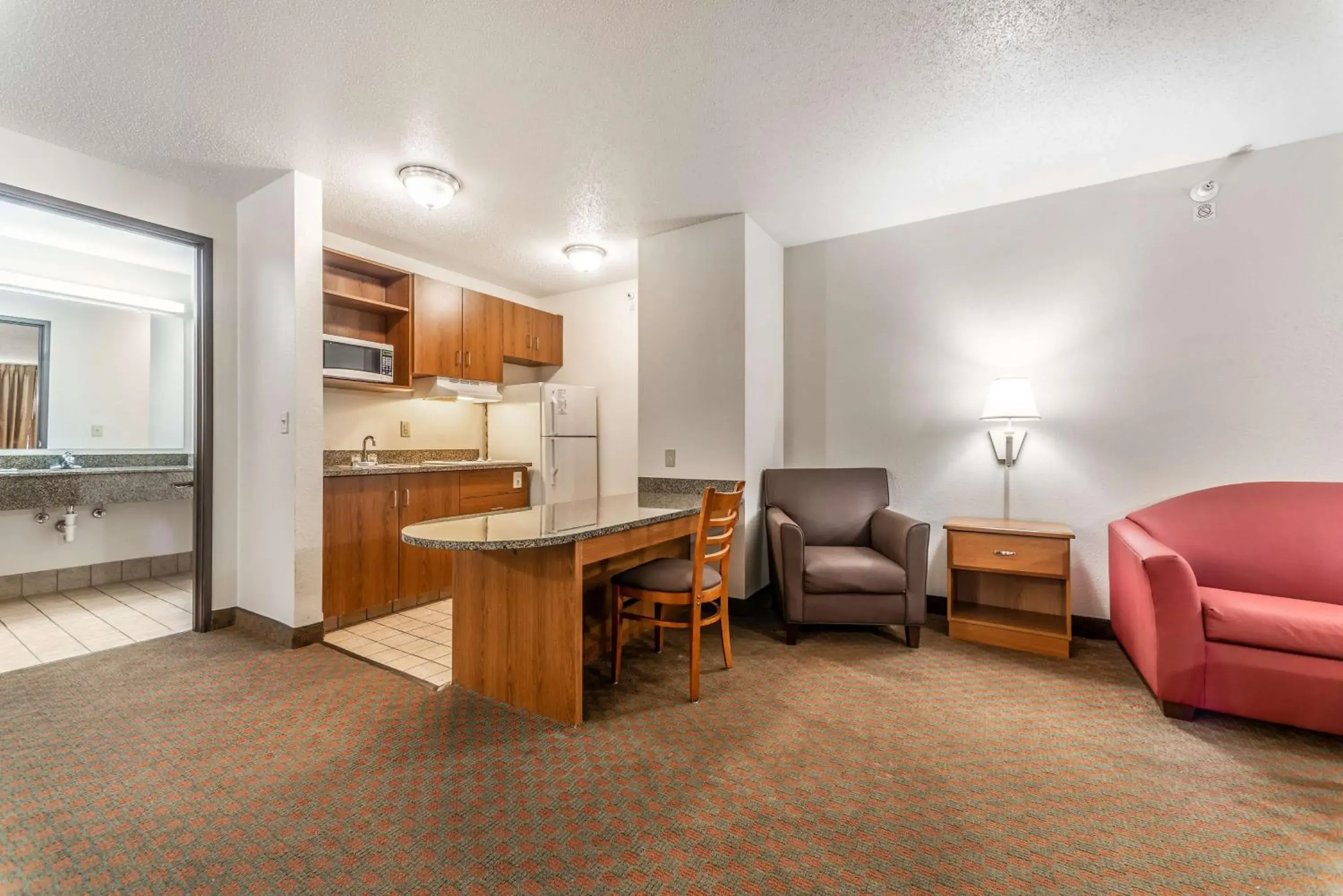 Bathroom, Seating Area in Welcome Suites-O'Fallon