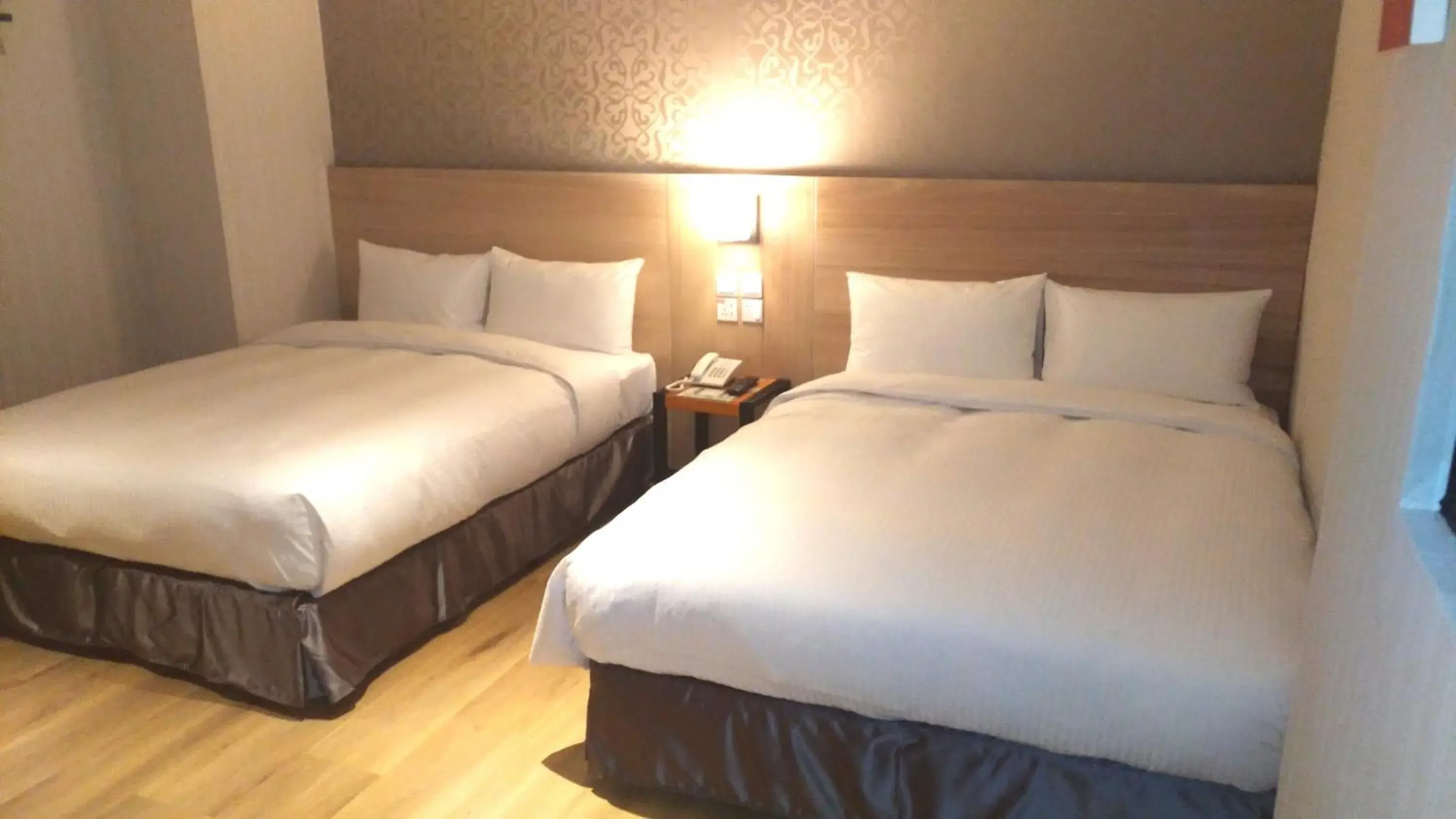 Bed in Lucky Apple Hotel