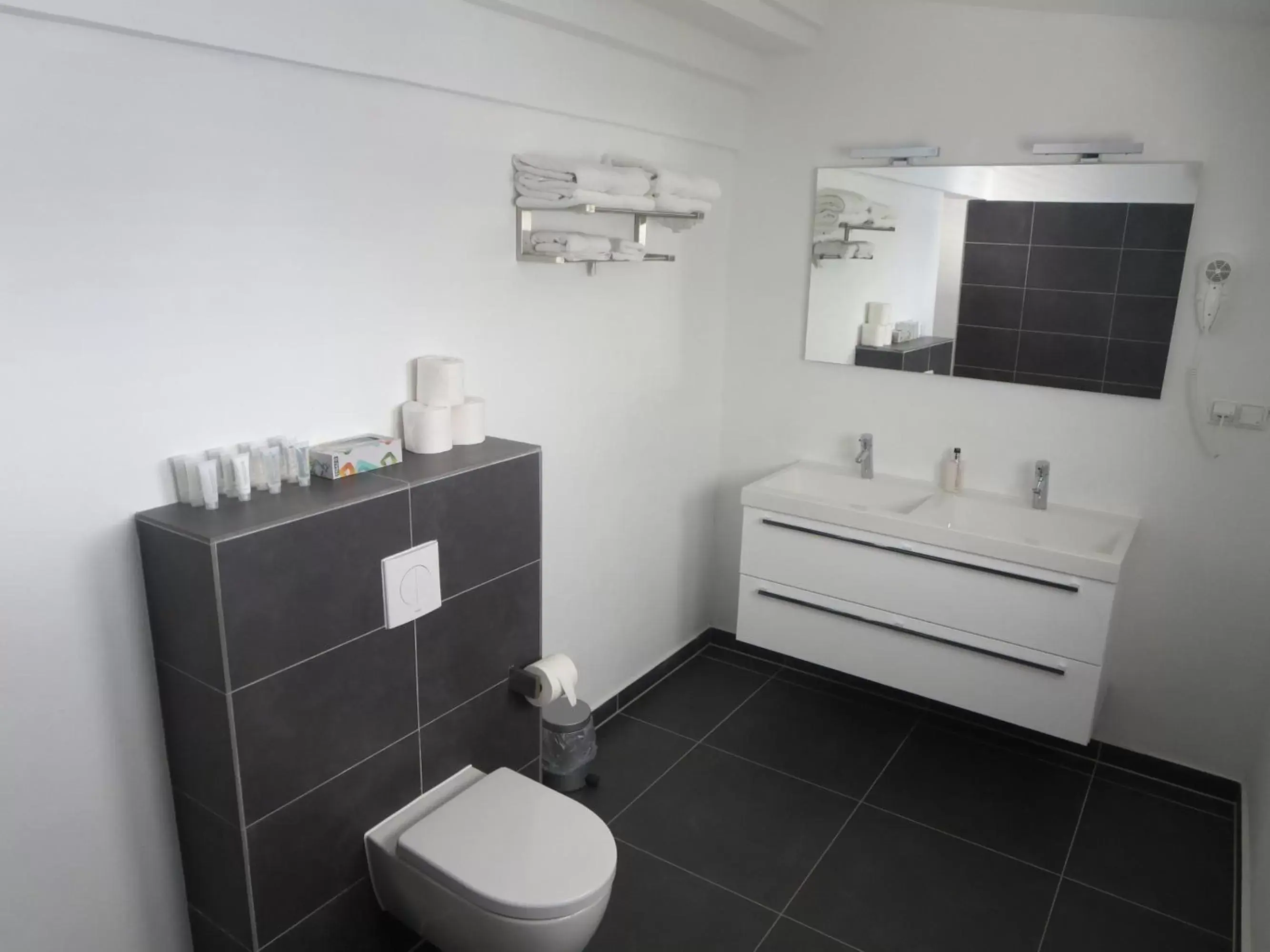 Bathroom in Scuba Lodge & Suites