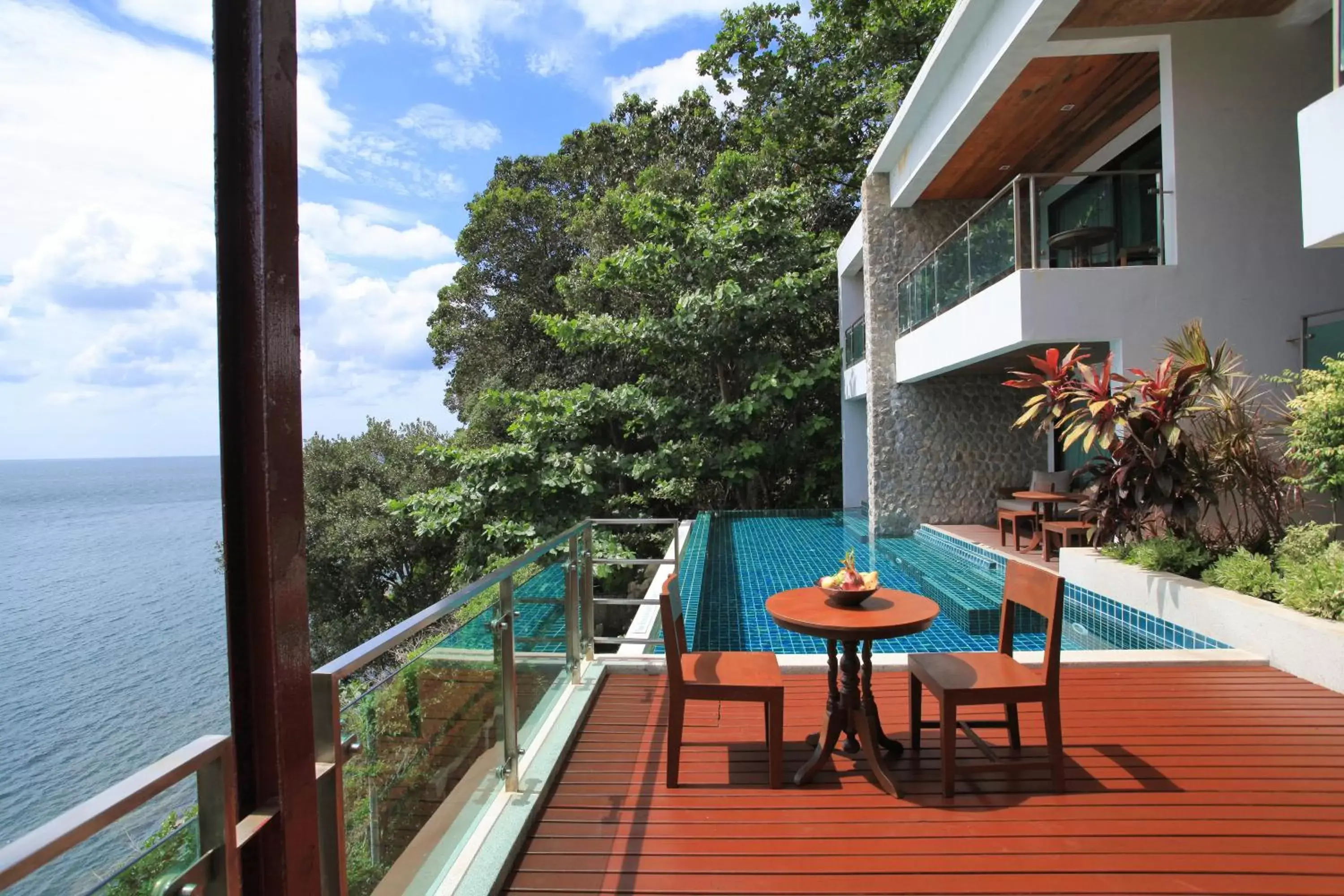 Pool view, Balcony/Terrace in Zenmaya Oceanfront Phuket, Trademark Collection by Wyndham