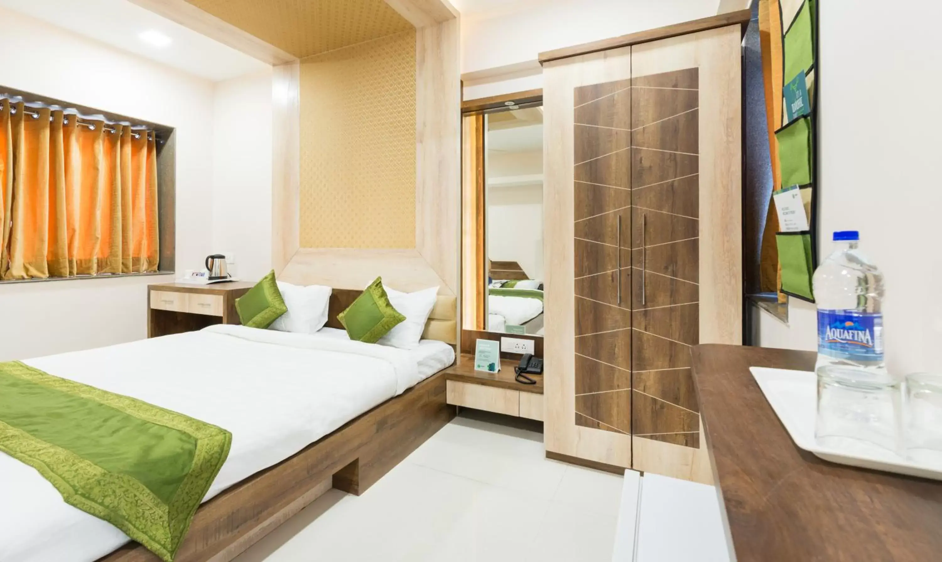 Bed in The Tripti Hotel & Banquets Bed in The Tripti Hotel & Banquets