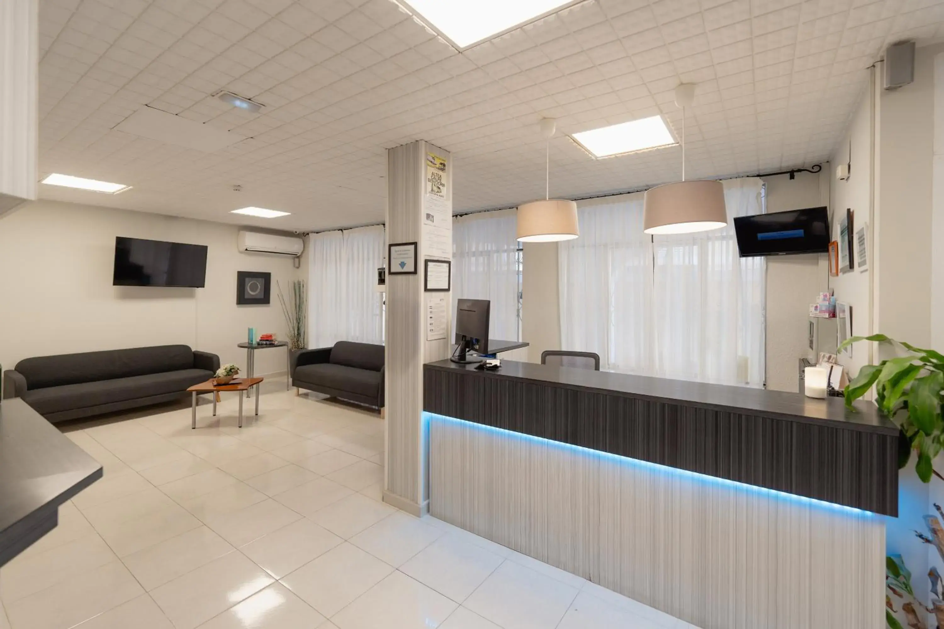 Lobby or reception in Hotel Santa Faz Lobby or reception in Hotel Santa Faz