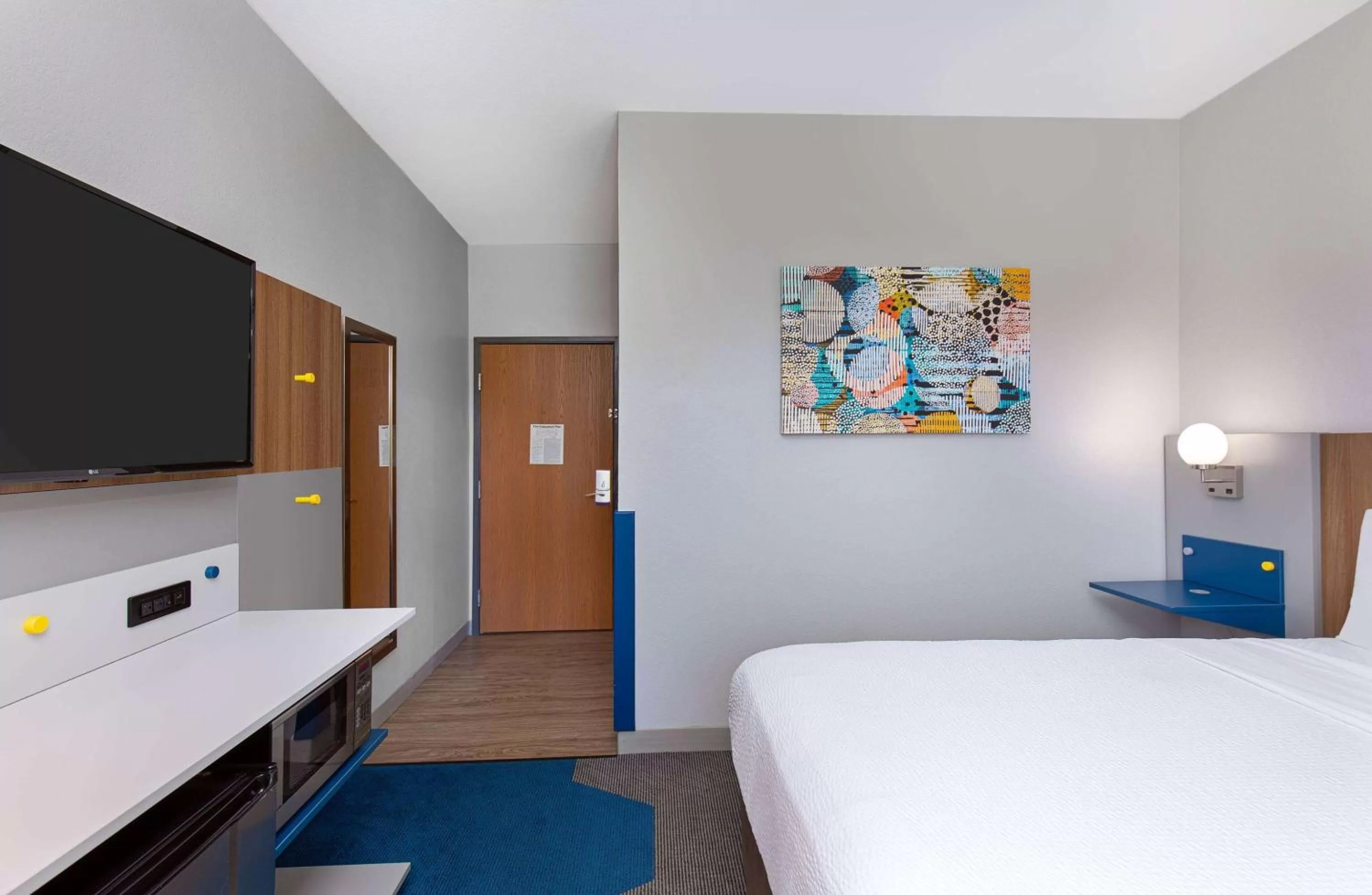 Bed in Microtel Inn and Suites by Wyndham