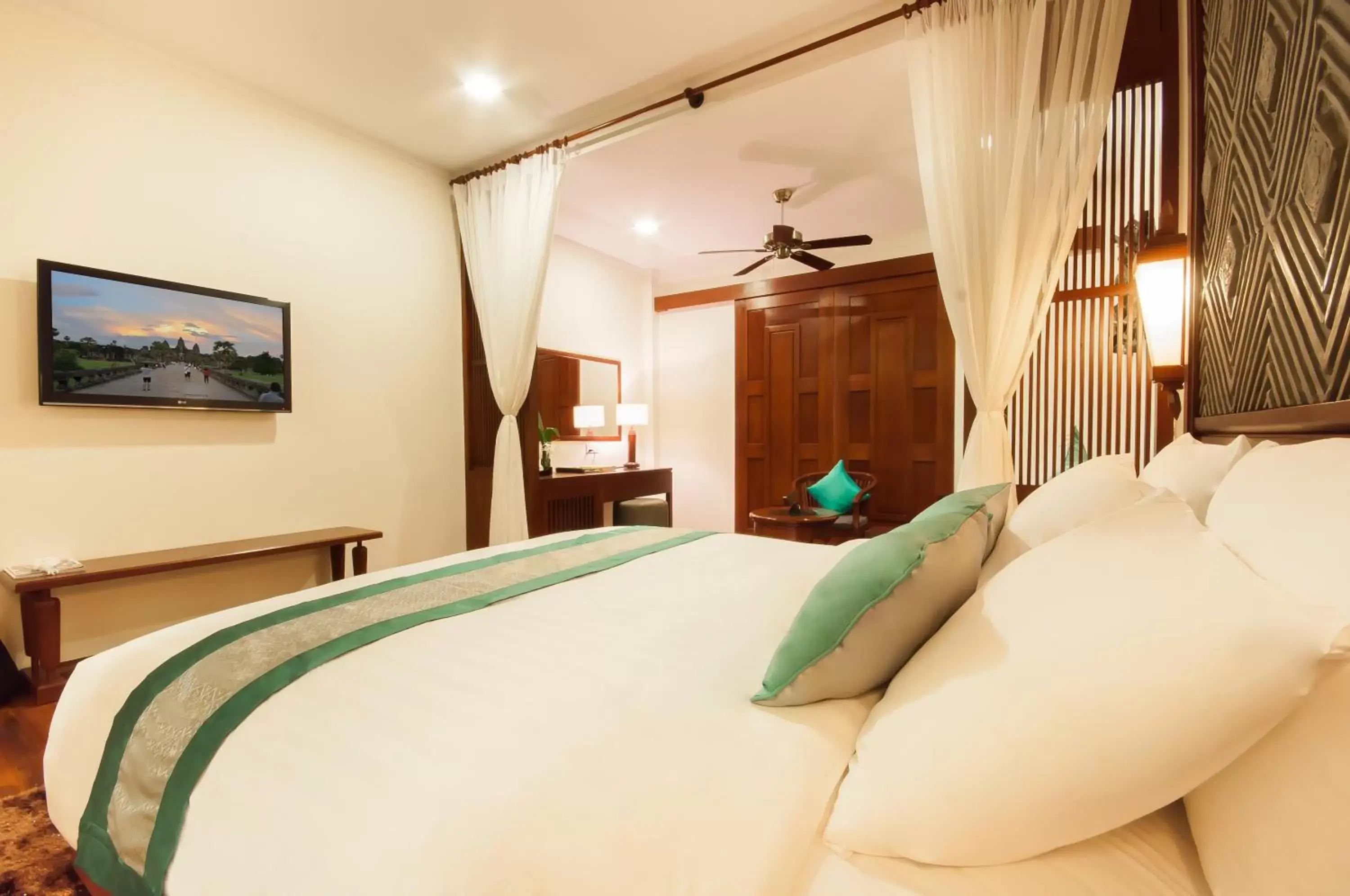 Bed in Lotus Blanc Hotel