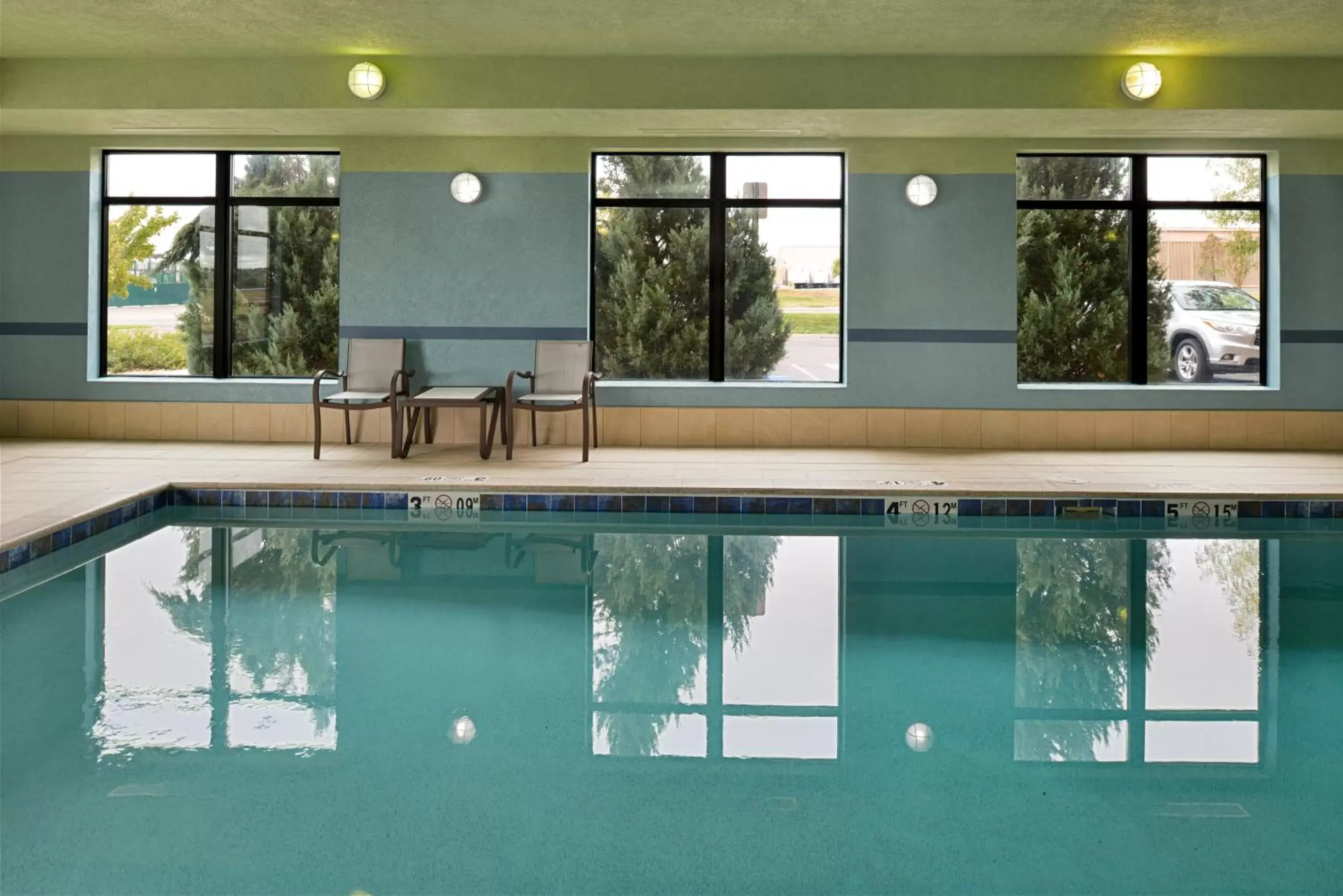 Swimming Pool in Holiday Inn Express & Suites Pueblo, an IHG Hotel