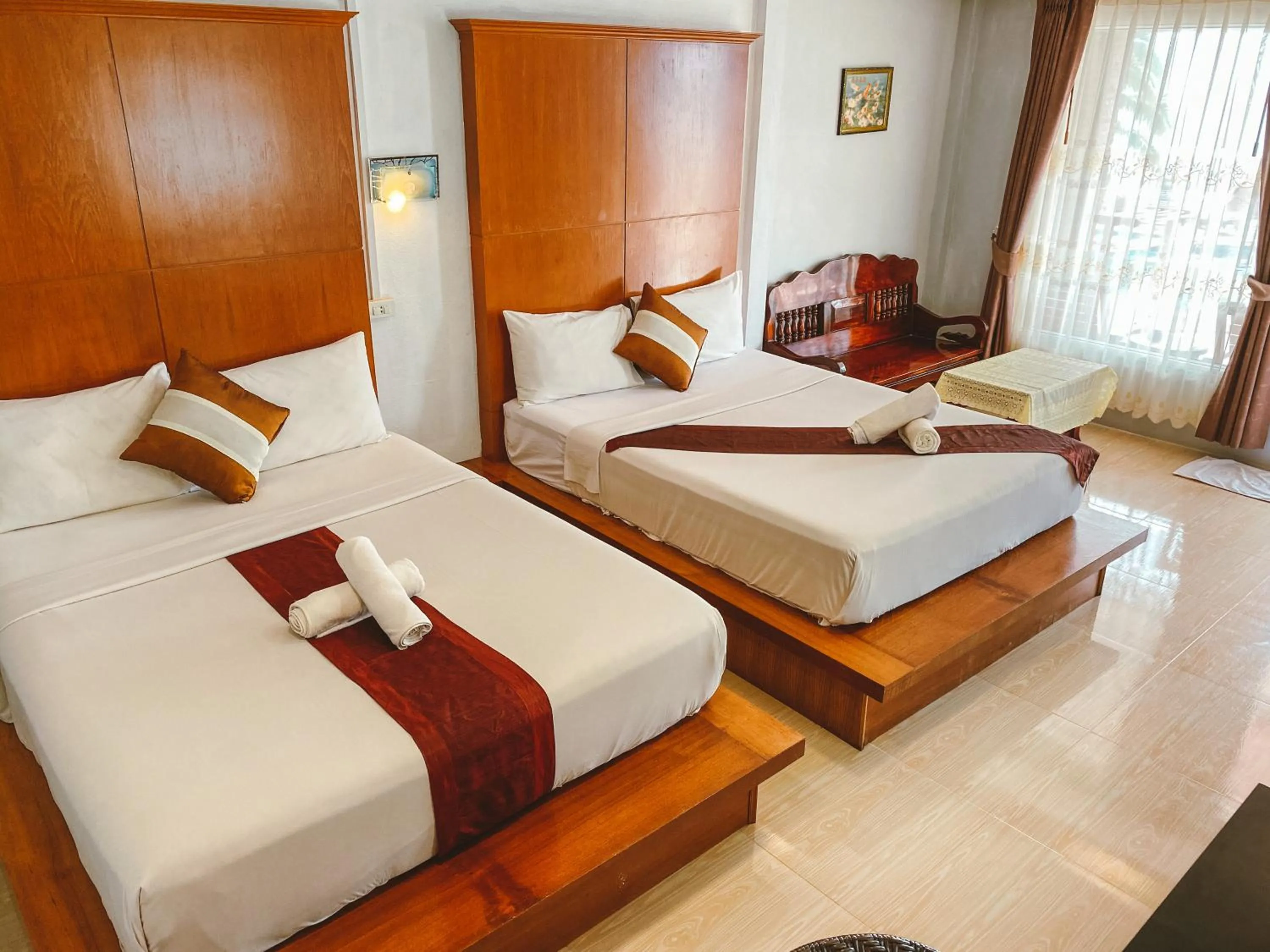 Bed in Lanta Paradise Beach Resort