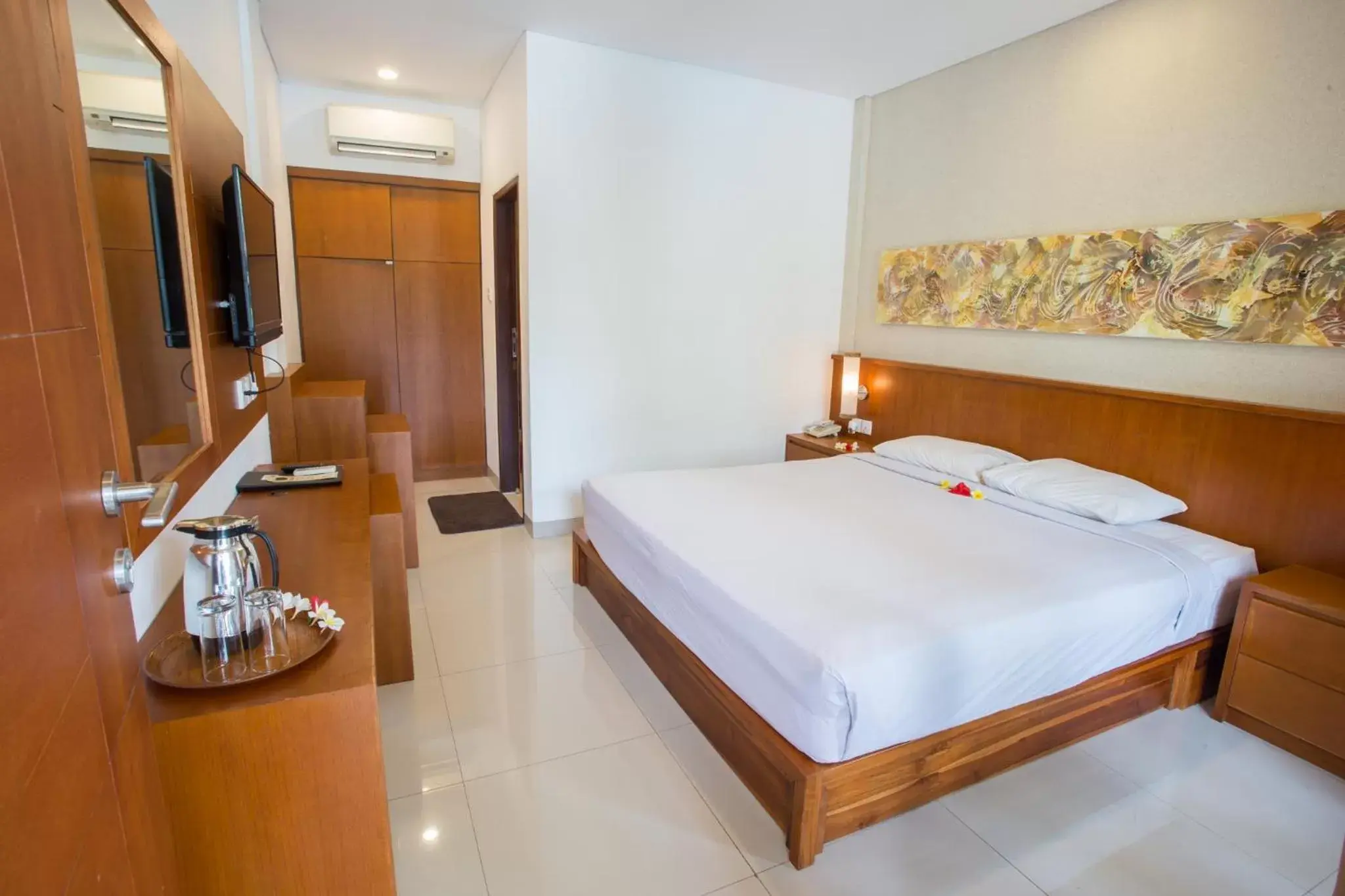 Bed in Sinar Bali Hotel