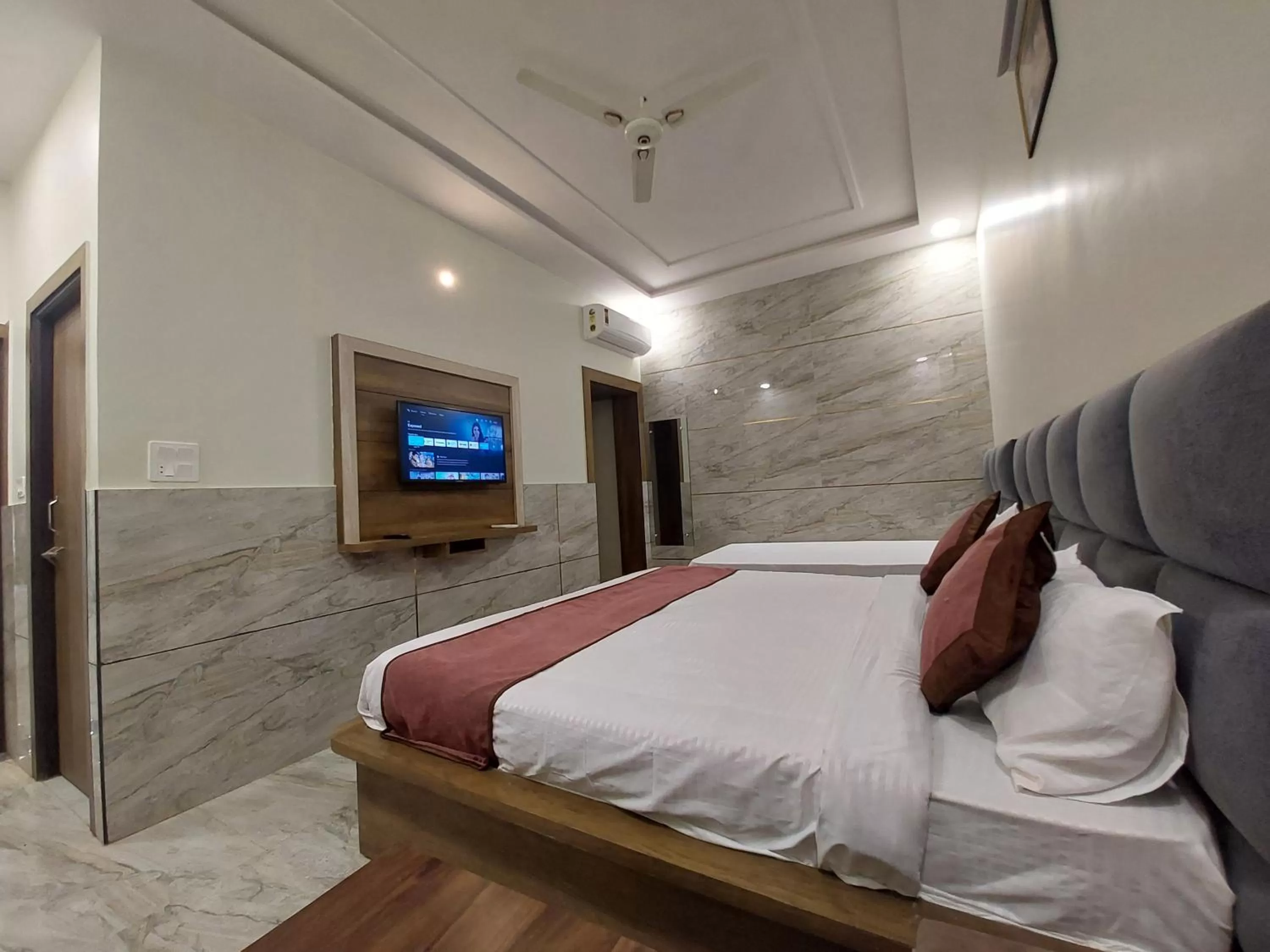 Photo of the whole room, Bed in Taj Nice Point Manage by Taj Sunrise Group