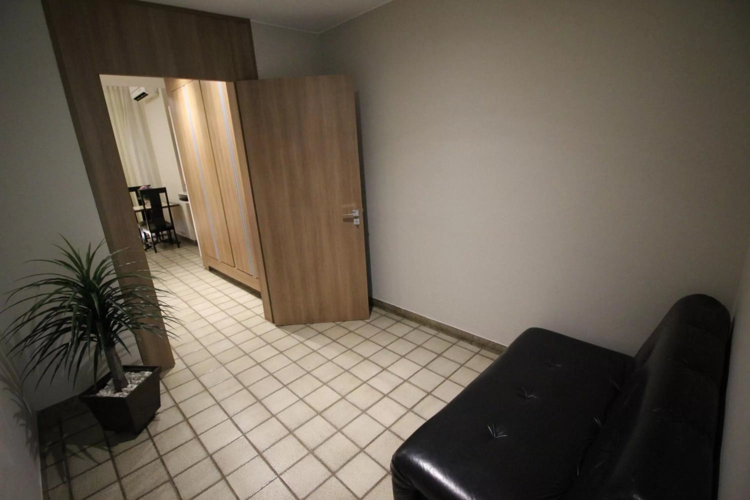 Seating area in Hotel Regina Muriaé