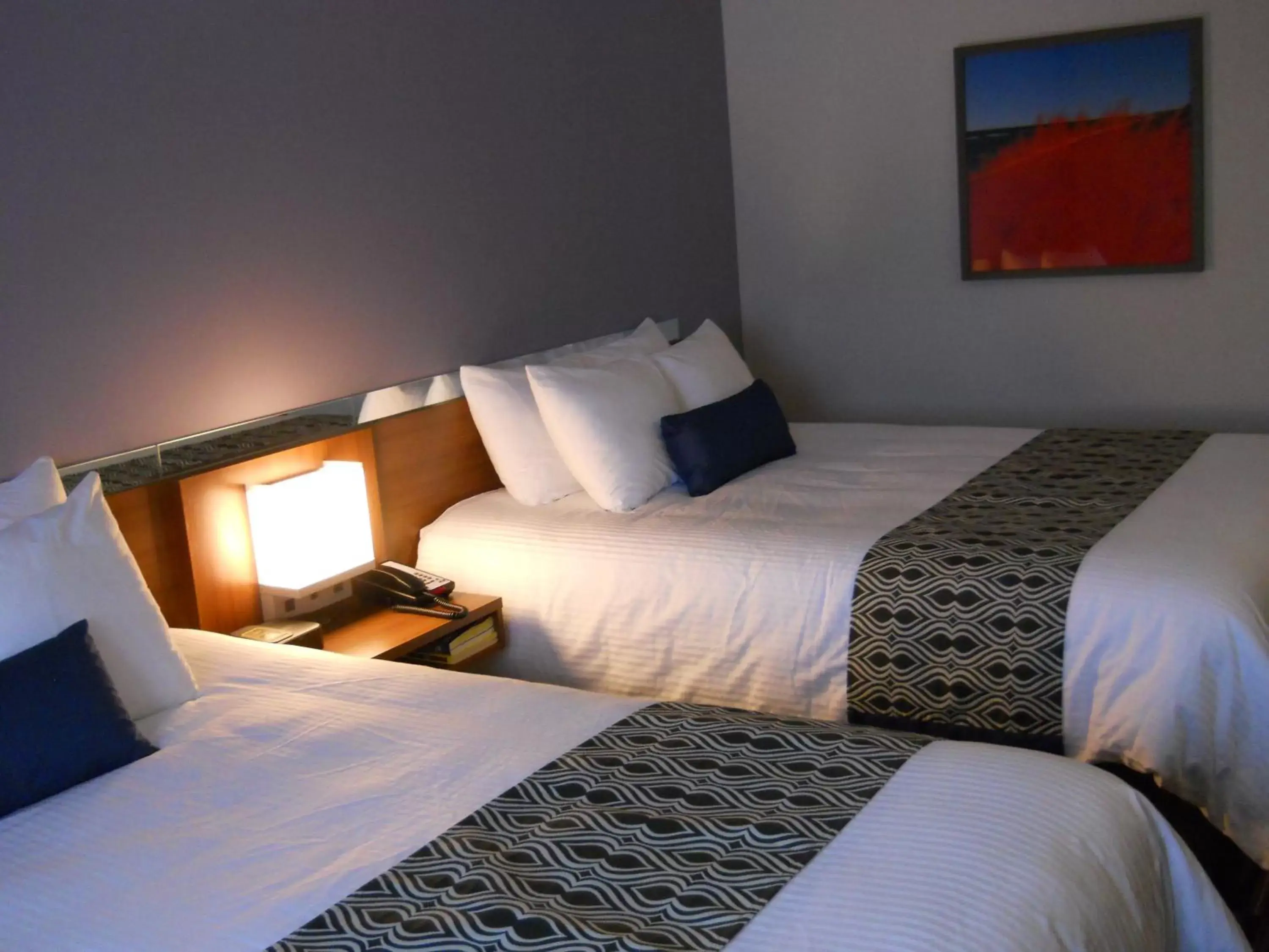 Bed in Microtel Inn & Suites Sault Ste. Marie