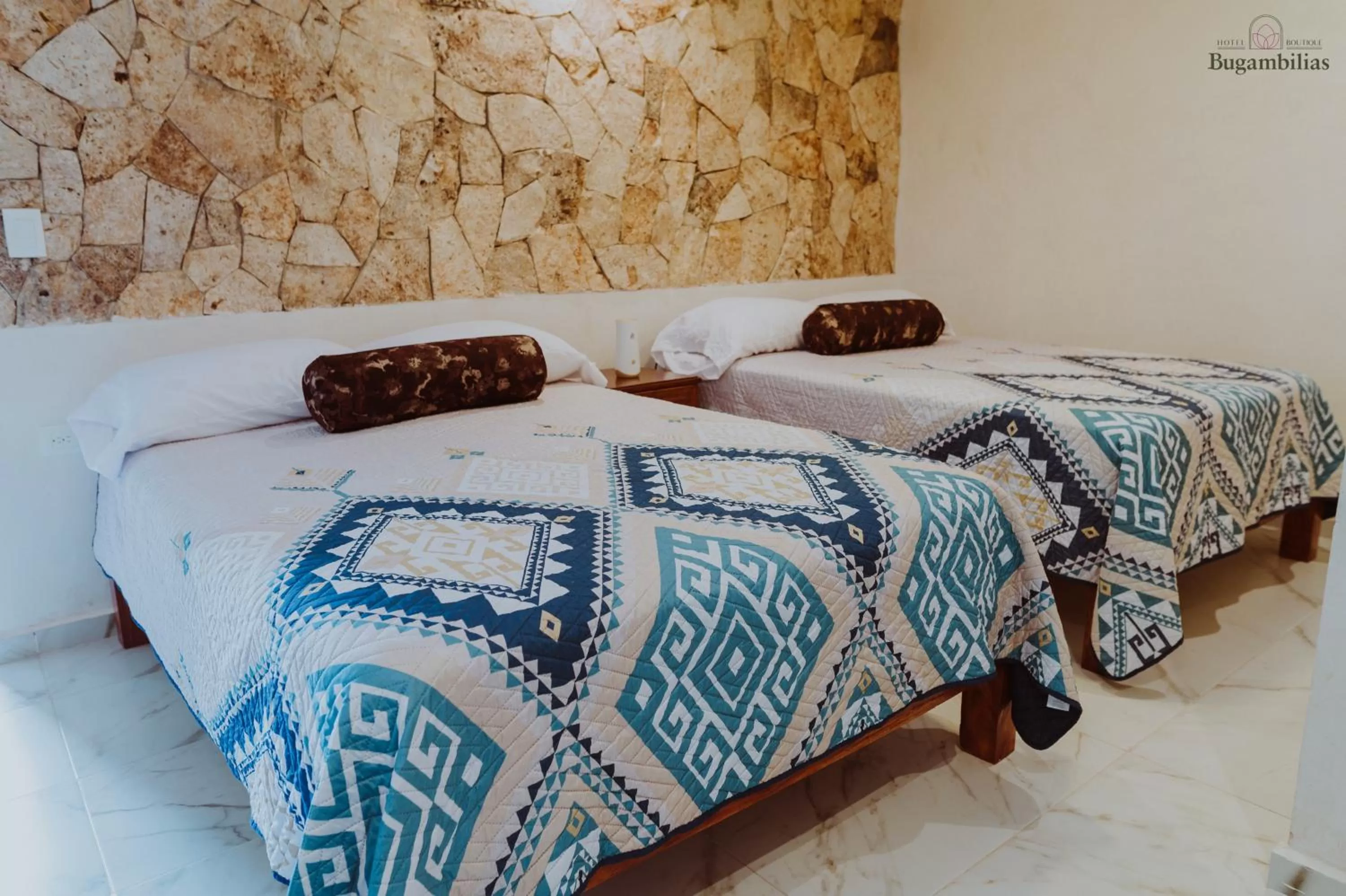 Bed in Hotel Boutique Bugambilias