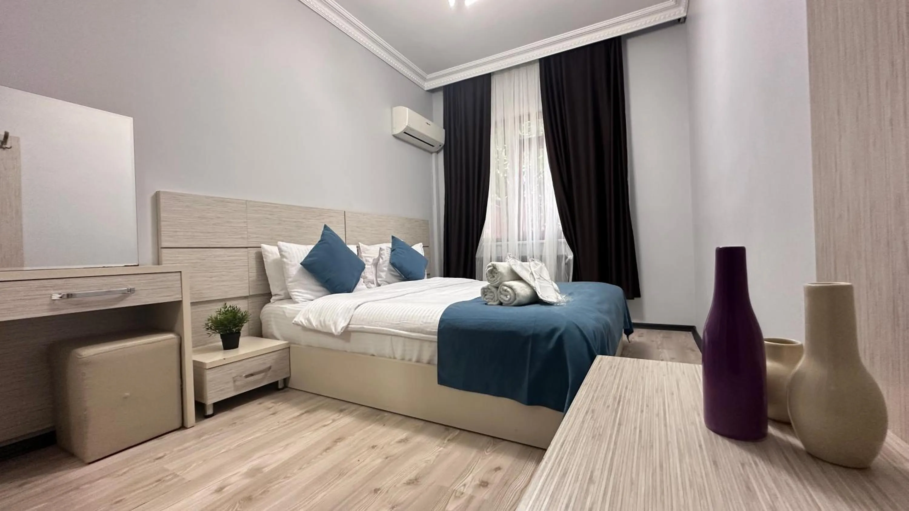 Bed in Overland Residence