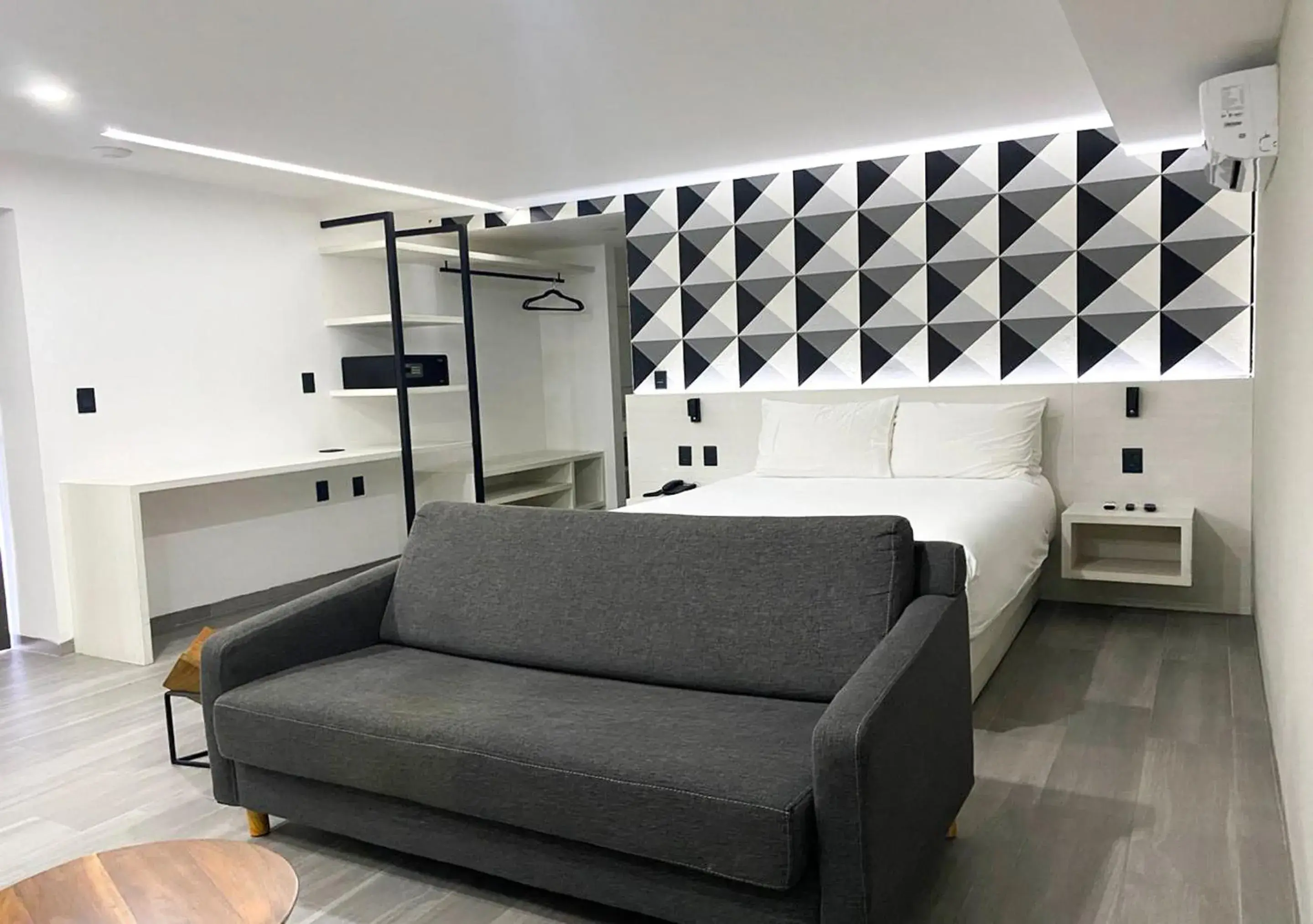 Bed, Seating Area in The Andy Hotel by DOT Boutique