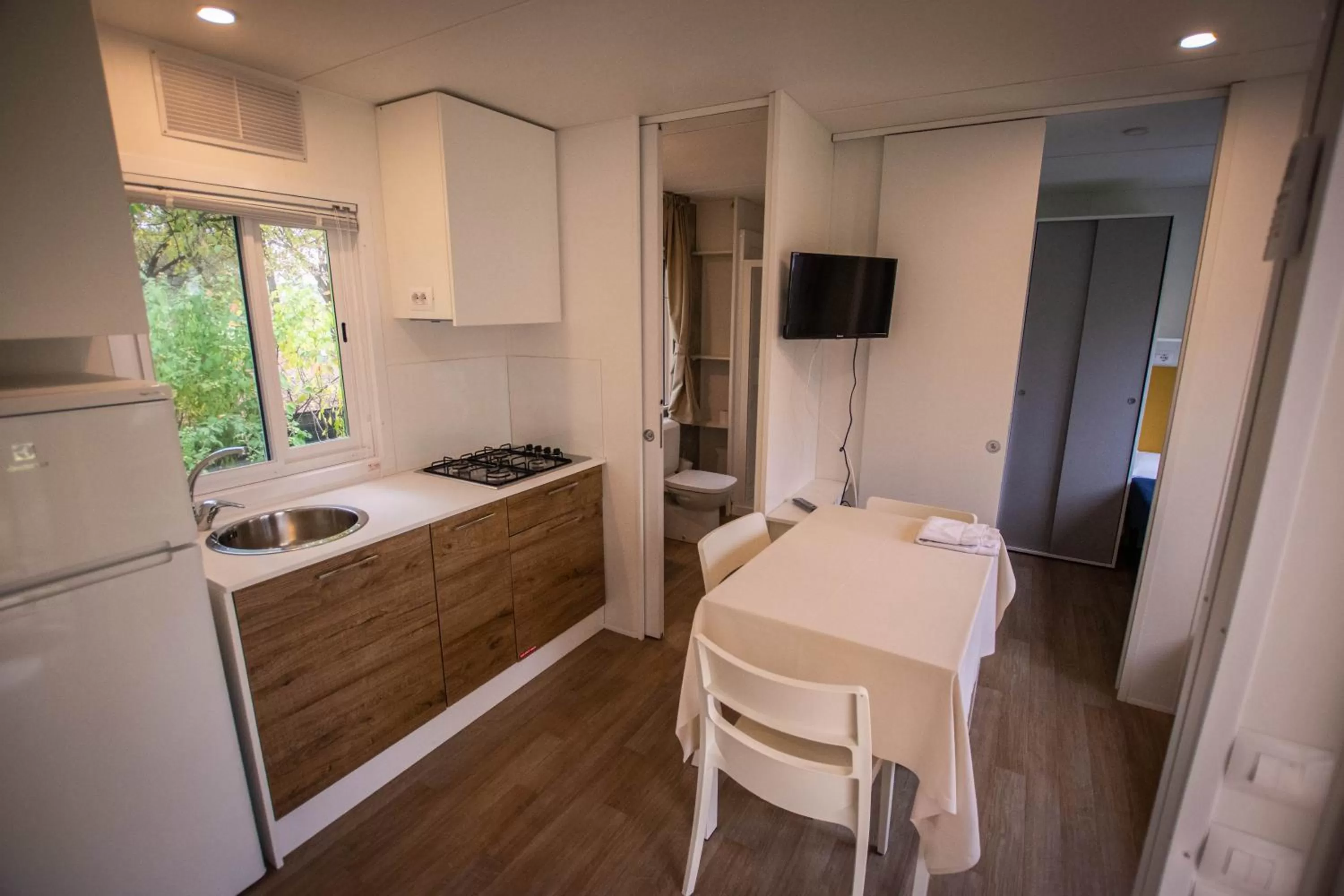 Kitchen/Kitchenette in AgriCamping AlbaVillage Hotel & Wellness