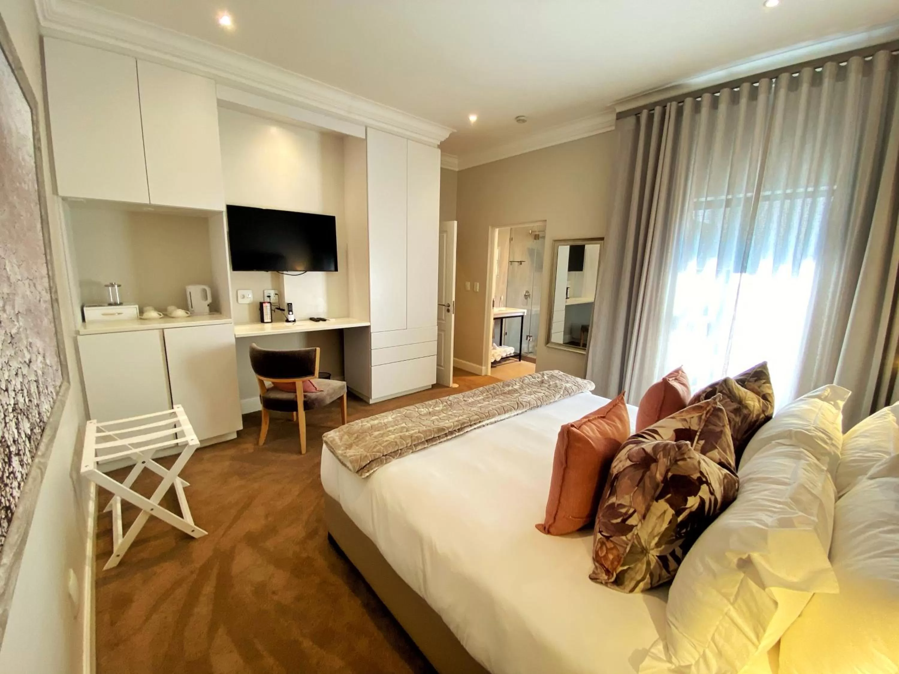 Bed in The Northcliff Boutique Hotel