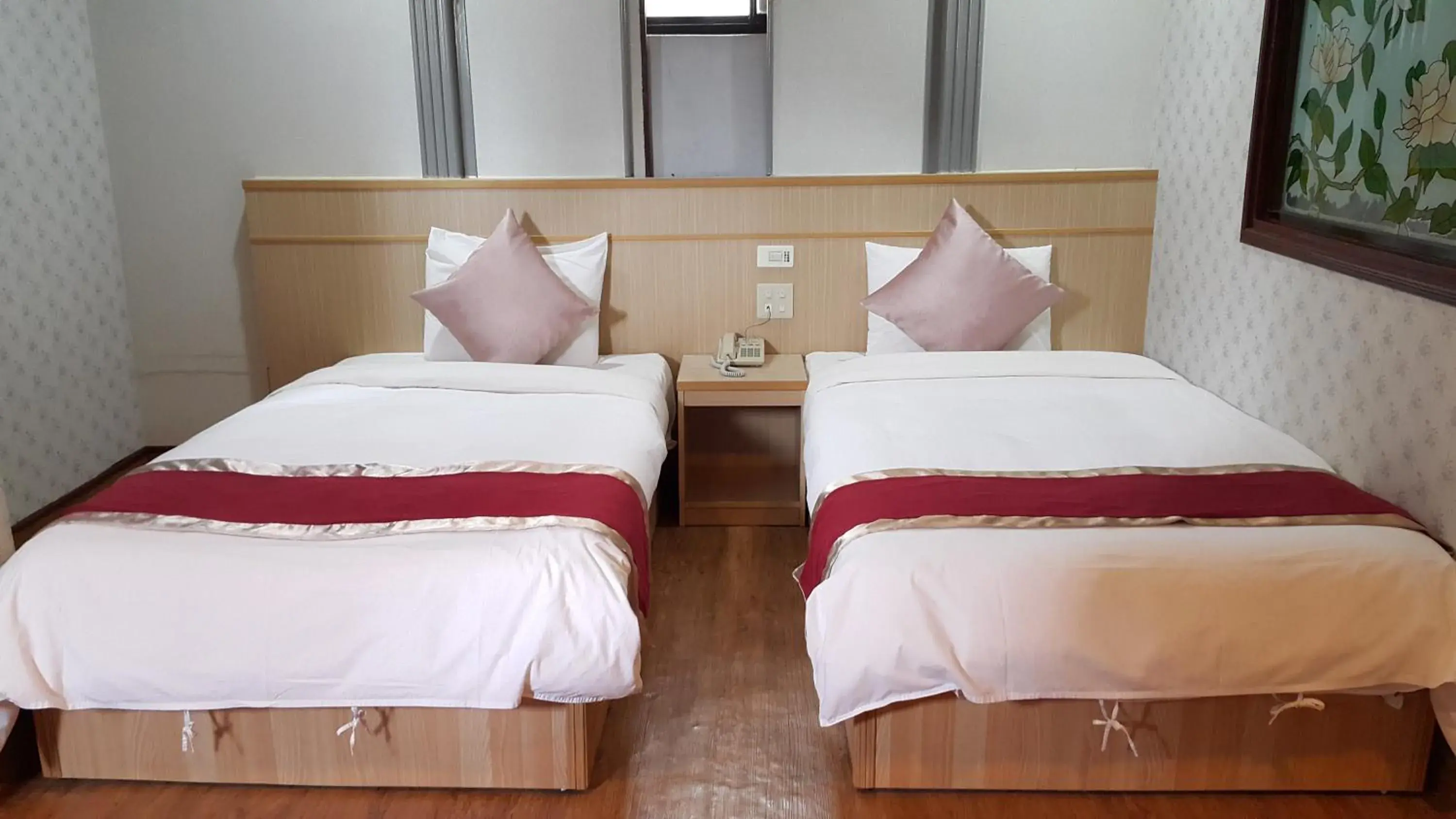 Bed in Mei-Hua Hotel