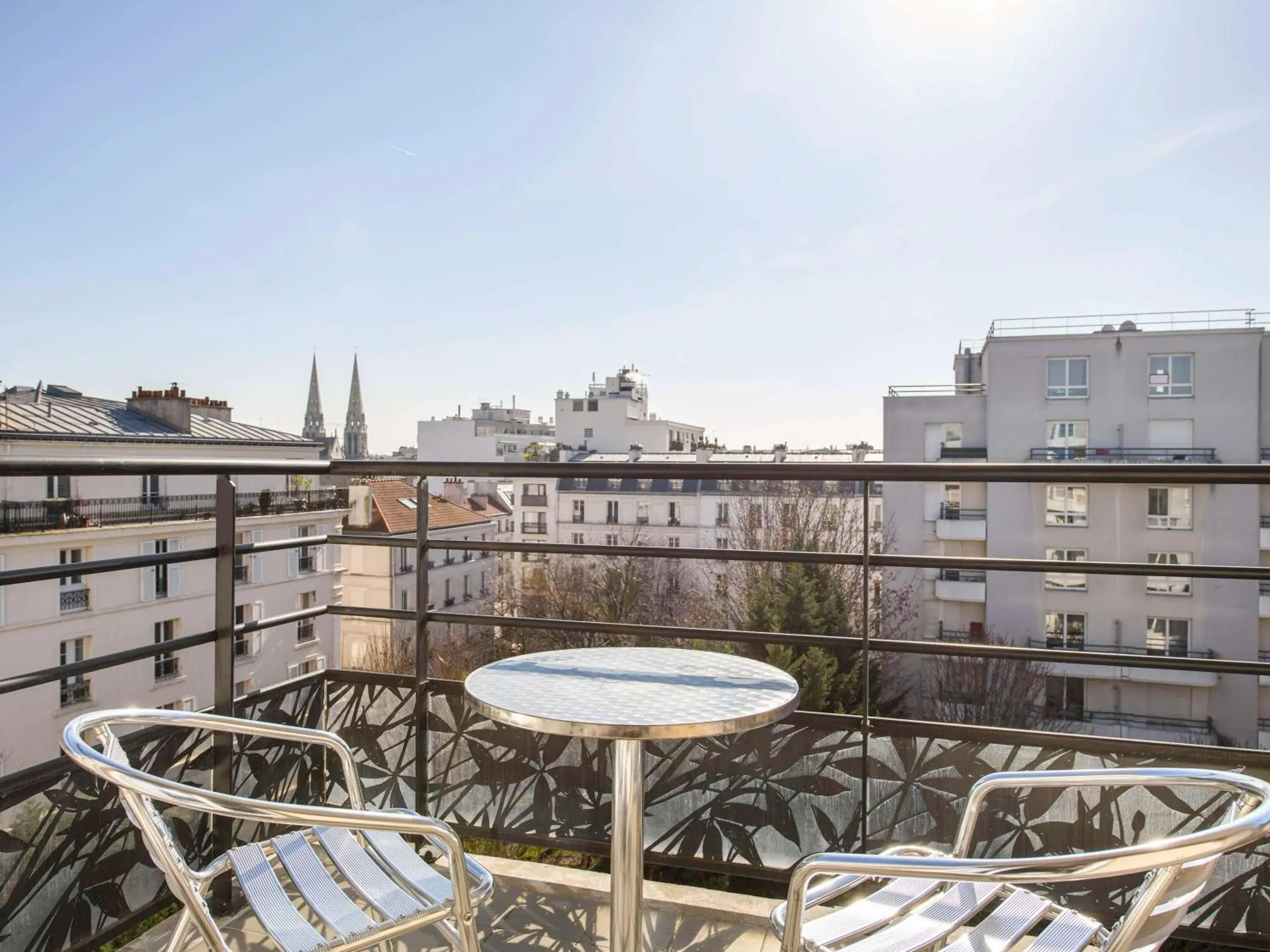 Bedroom, Balcony/Terrace in Adagio Paris Buttes Chaumont Aparthotel