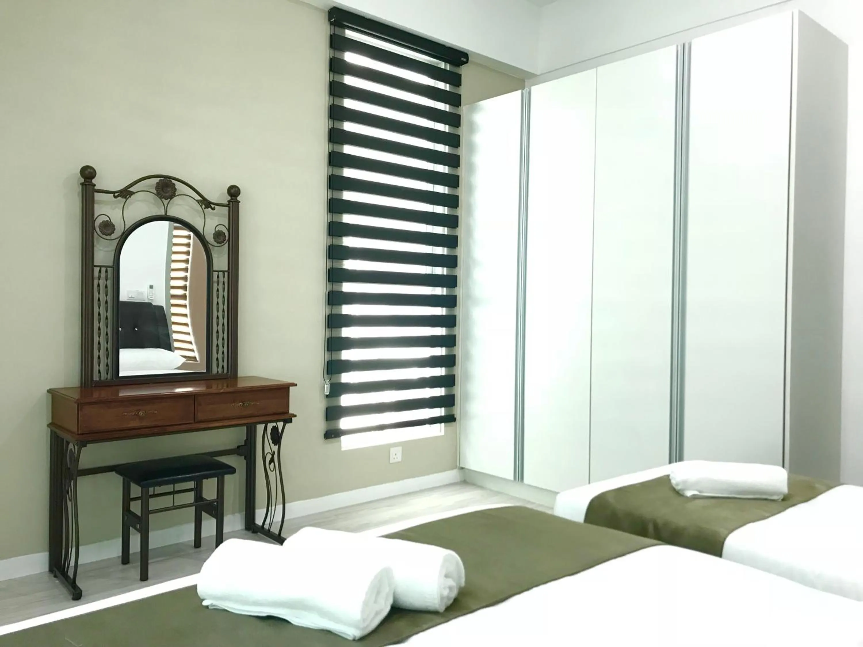 Bed in Sunset Seaview Vacation Condos @ Infinity Avenue