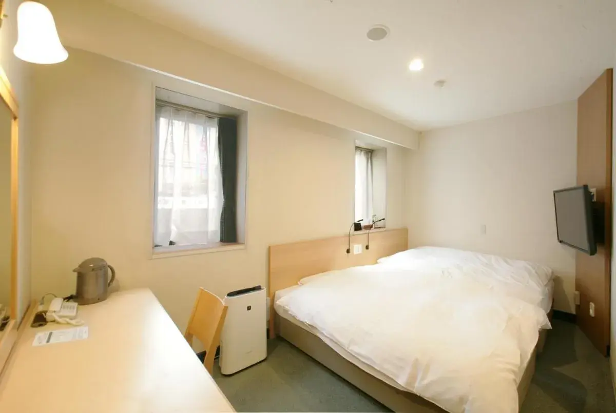 Bed in Ace Inn Matsumoto