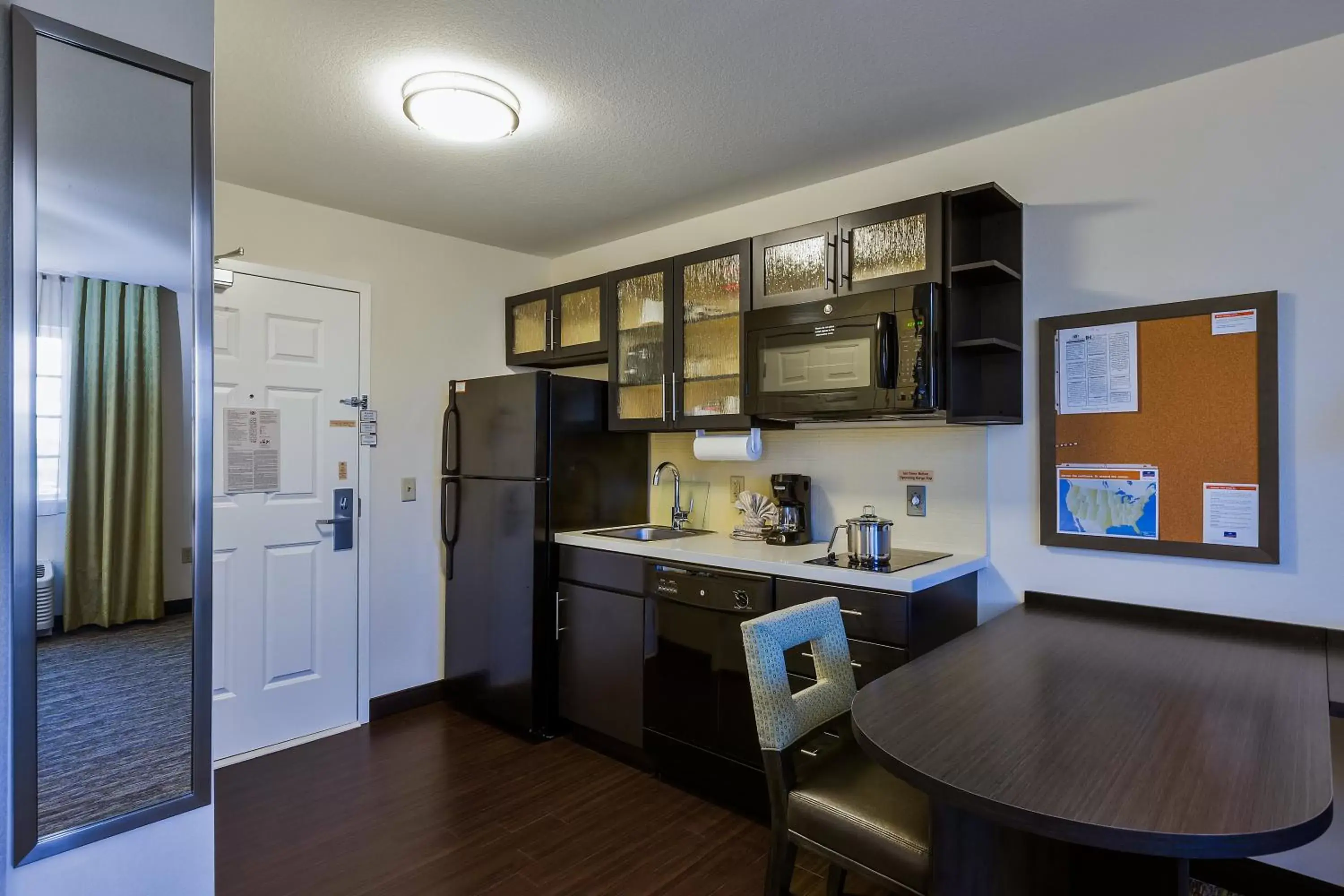 Photo of the whole room, Kitchen/Kitchenette in Candlewood Suites Tucson, an IHG Hotel