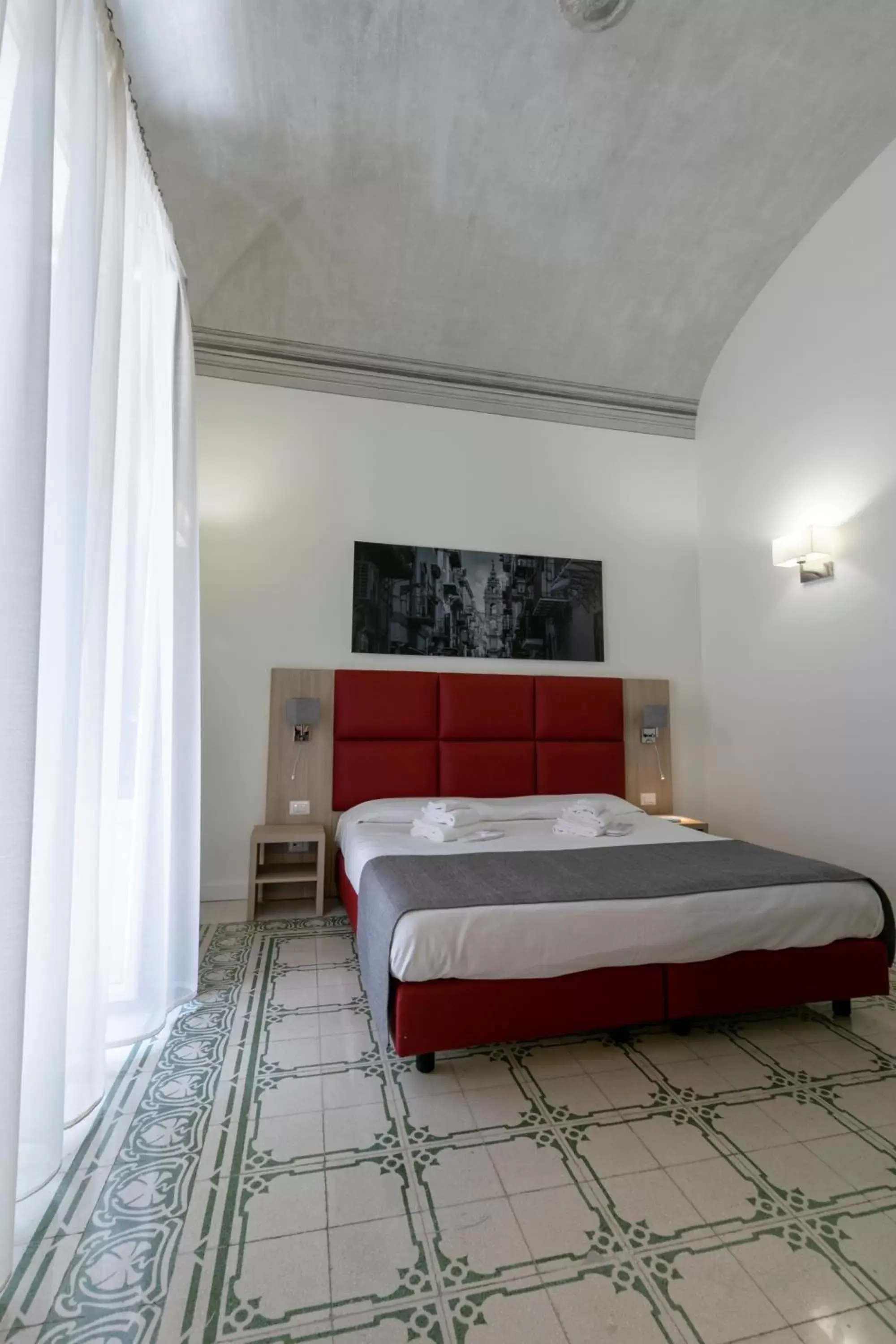 Bed in Belmonte102 Esclusive Suites