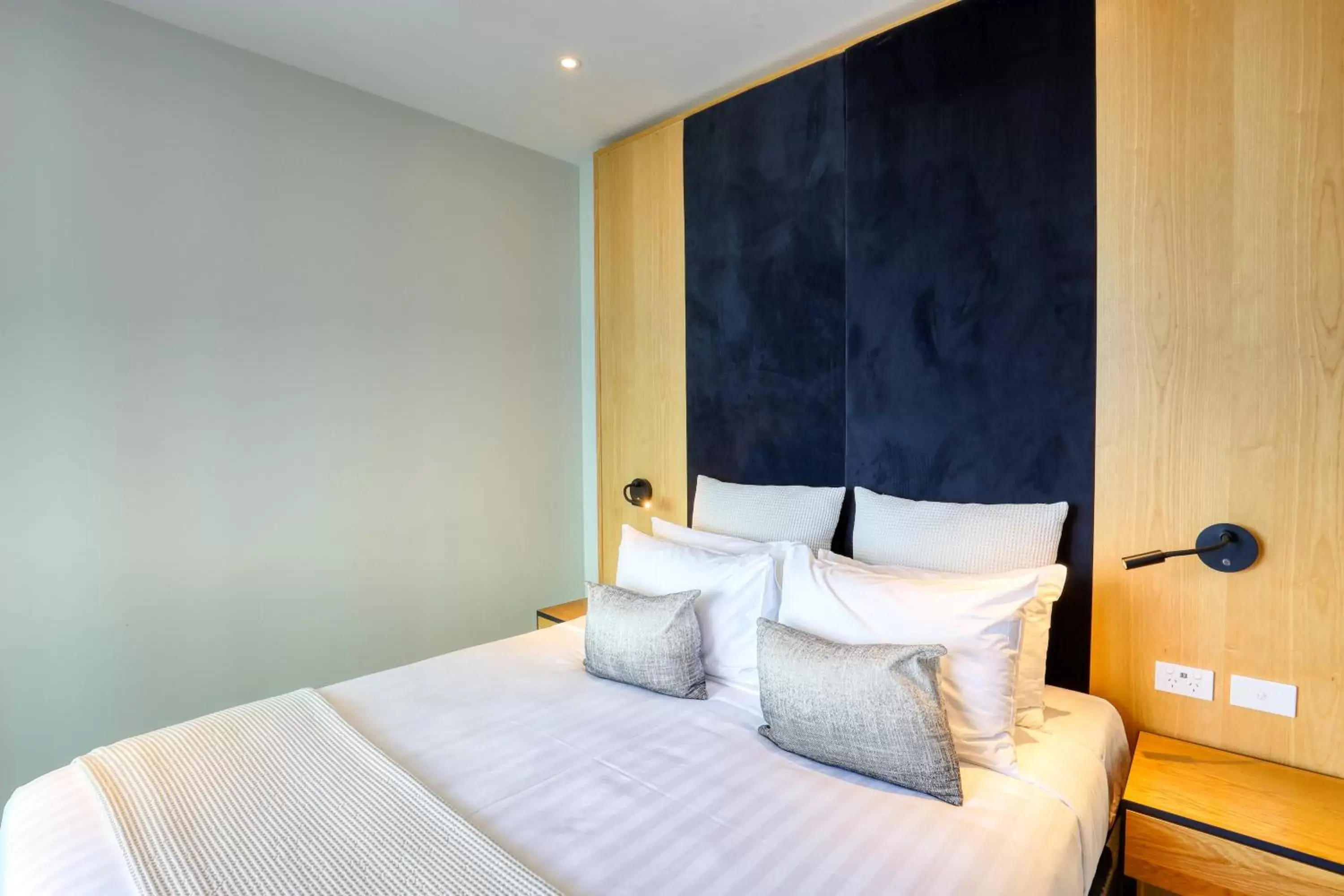 Bedroom, Bed in Ramada Suites by Wyndham Nautilus Orewa