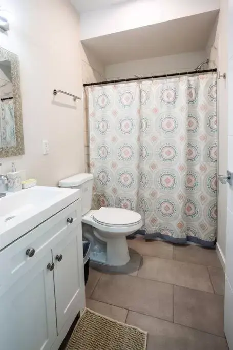 Bathroom in One Bedroom Apartment with SD Downtown View