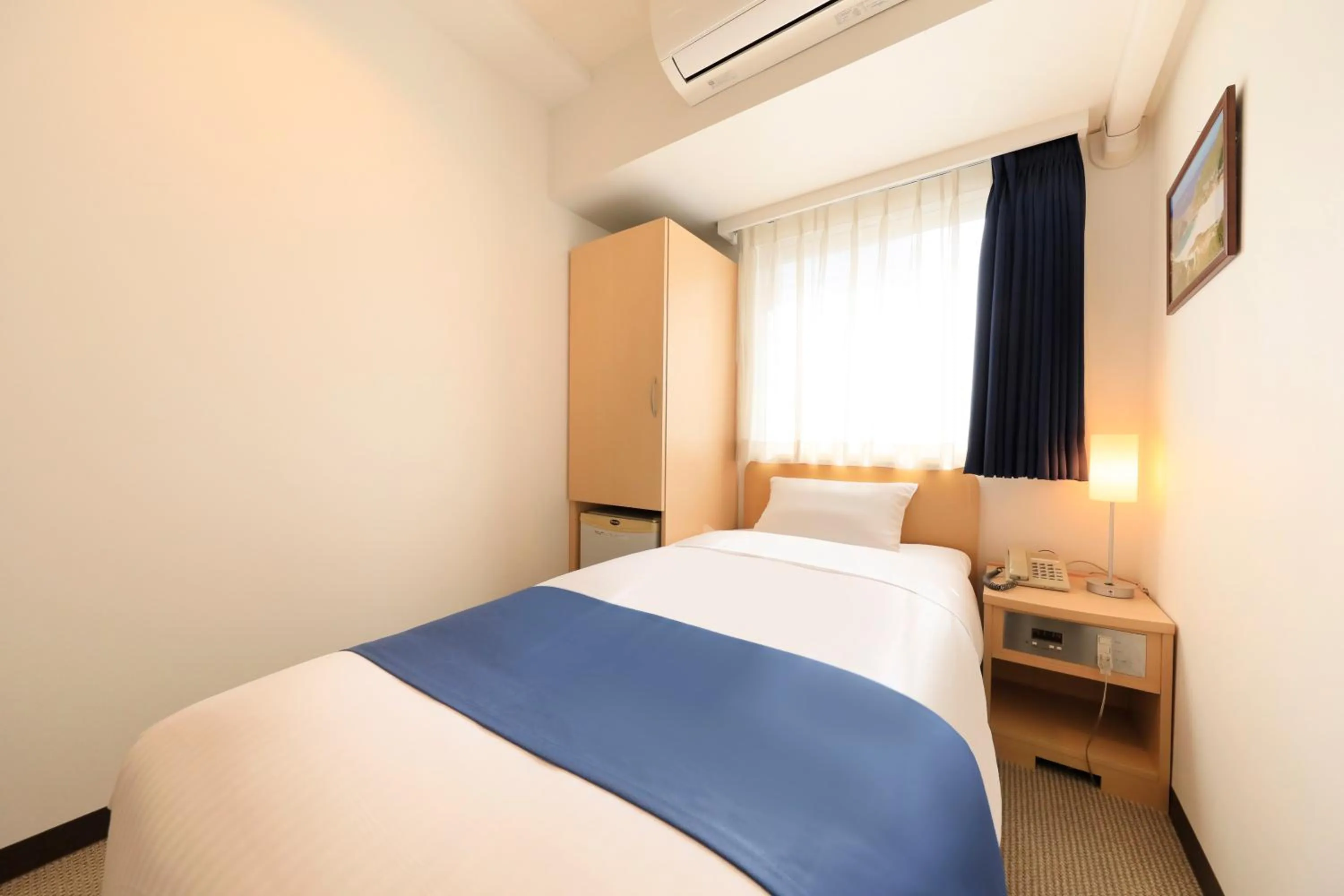 Photo of the whole room, Bed in Hotel Famy Inn Kinshicho