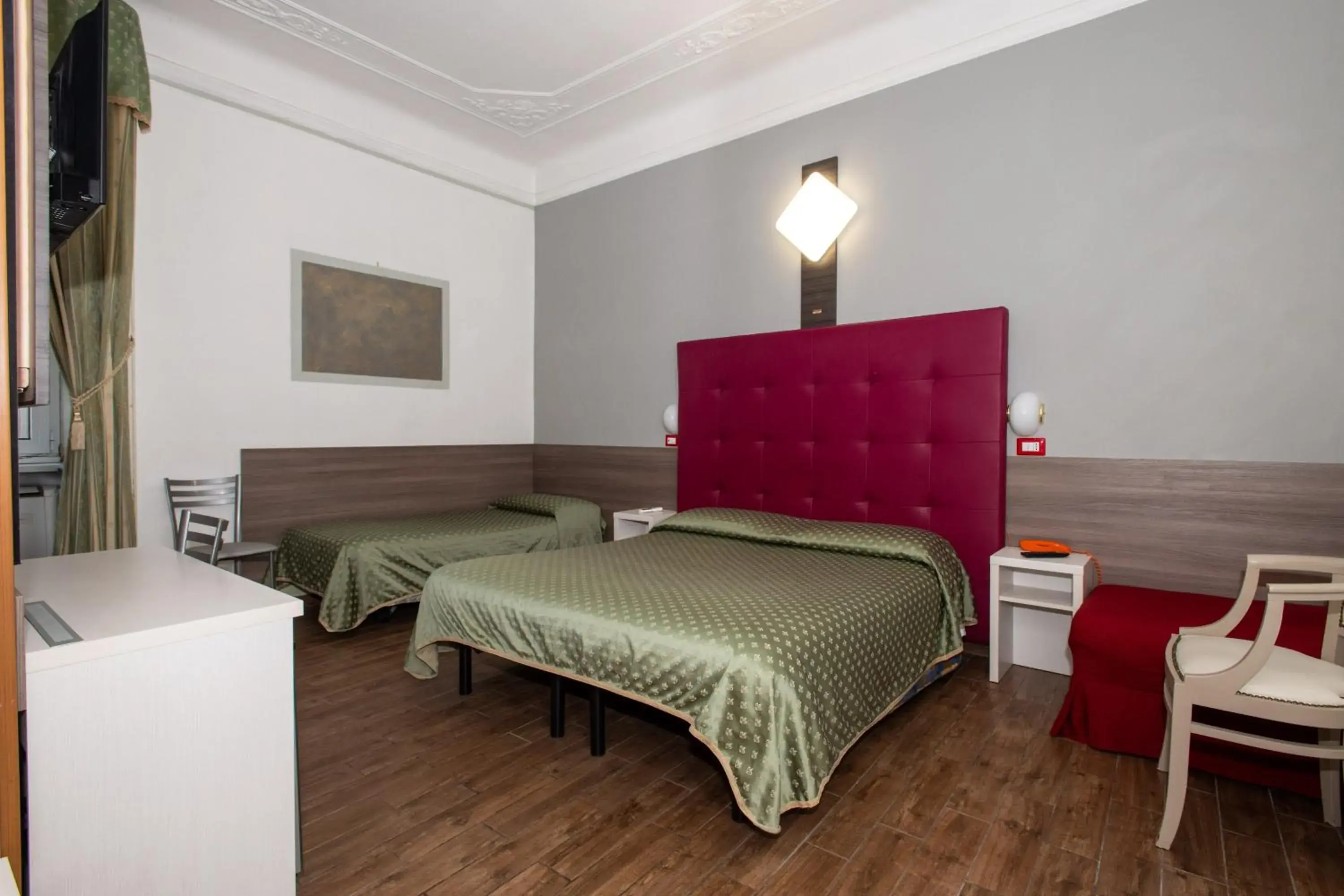 Bed in Hotel Piola
