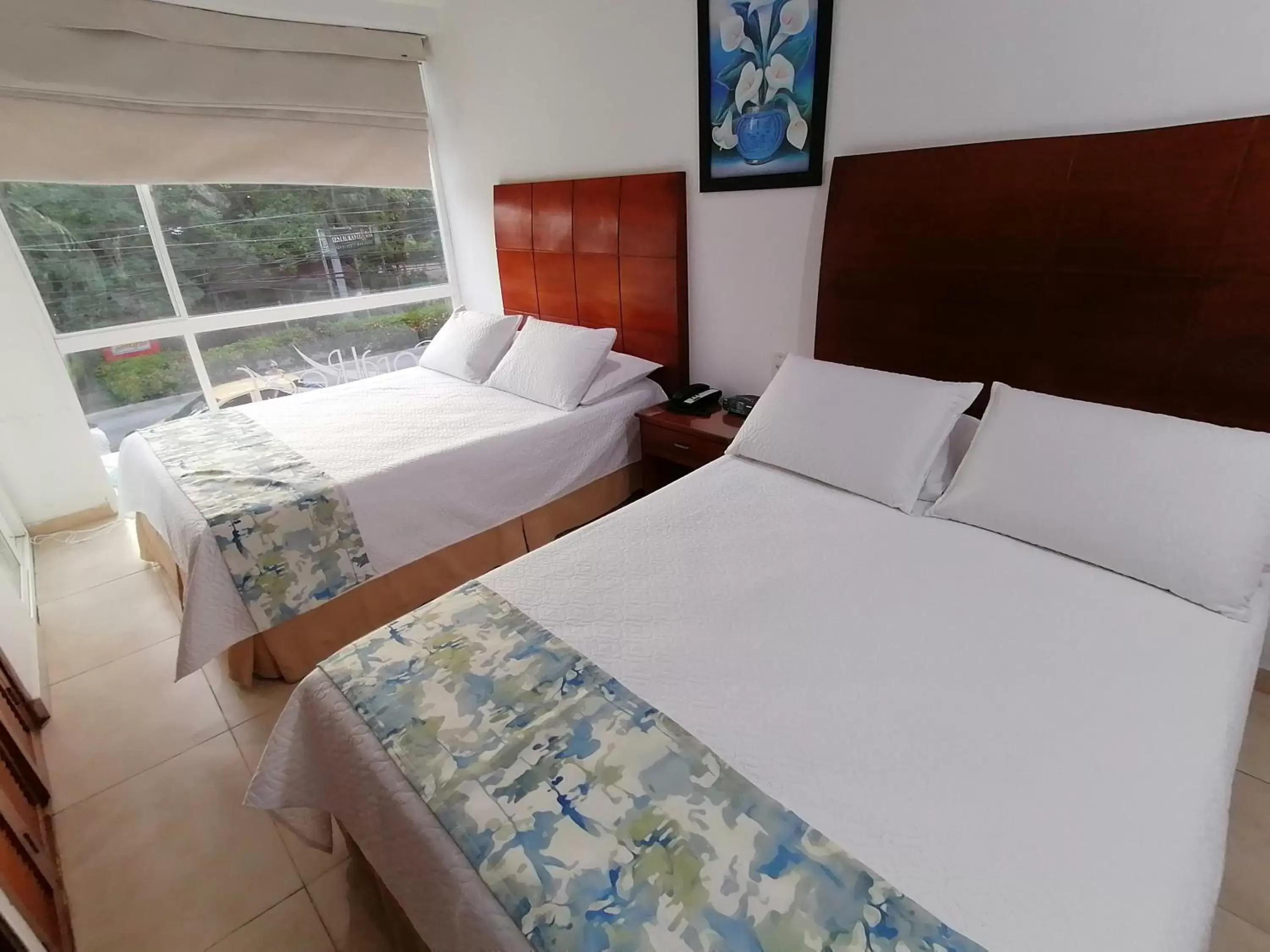 Bed in Coral Reef Hotel