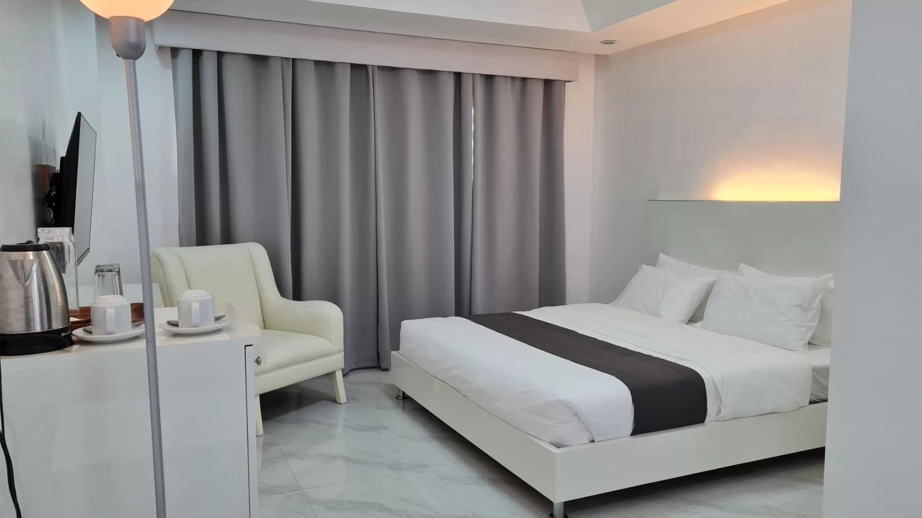 Photo of the whole room, Bed in Staycation Hotel