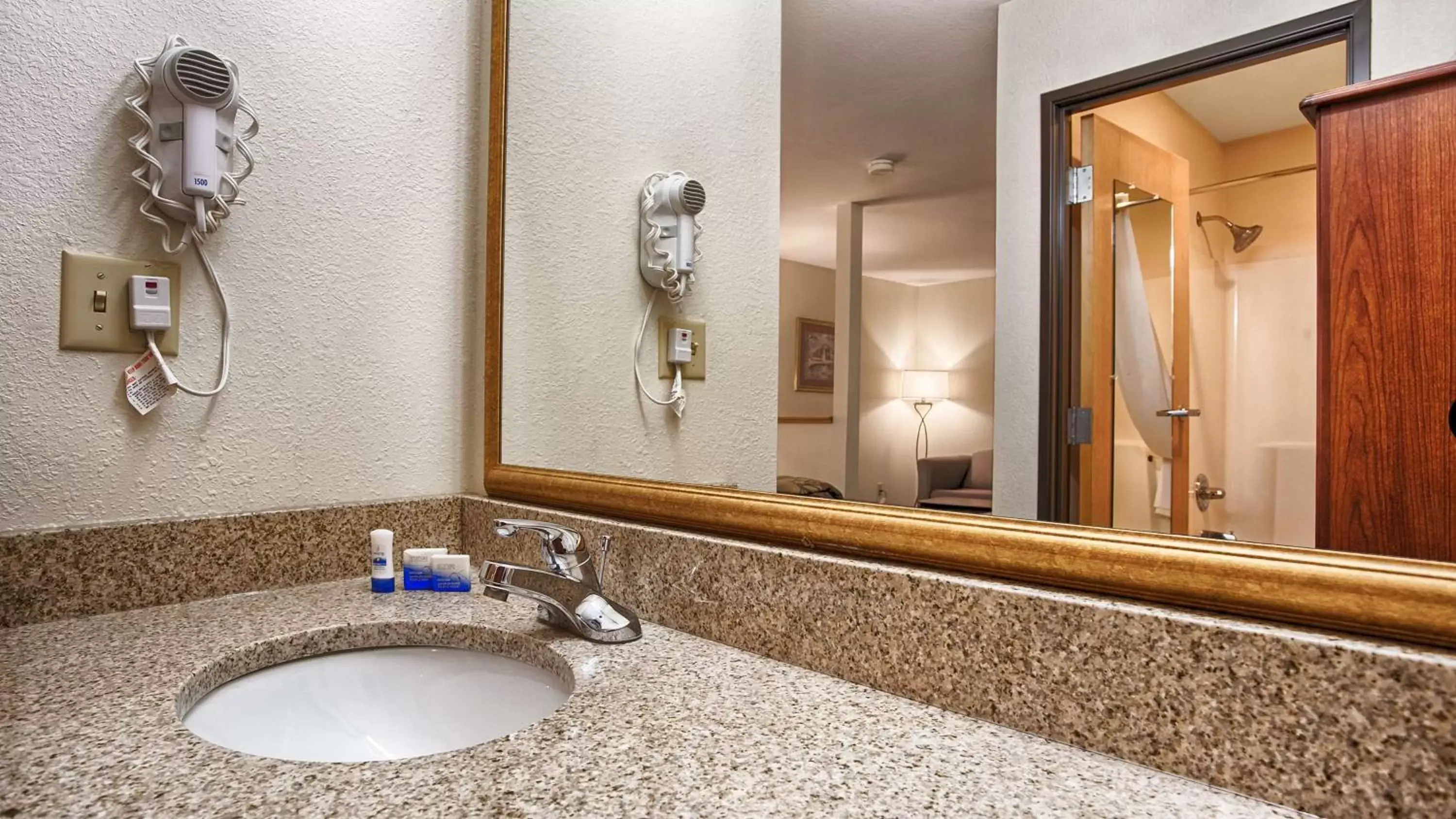 Bathroom in SureStay Hotel by Best Western Ottawa