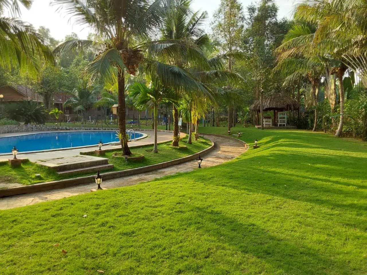 Swimming pool, Garden in The Garden House Phu Quoc Resort