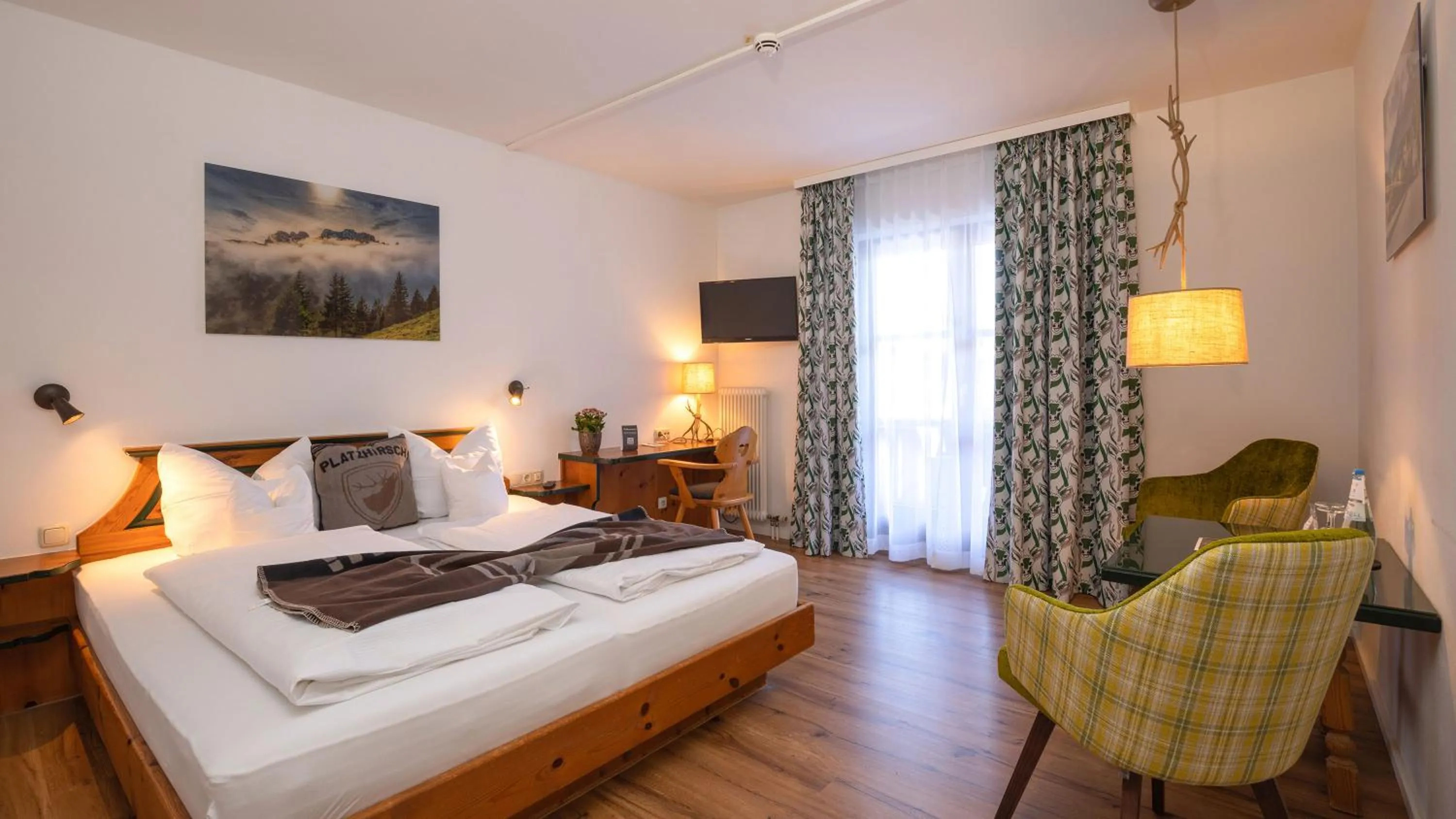 Photo of the whole room, Bed in Das Bergmayr - Chiemgauer Alpenhotel