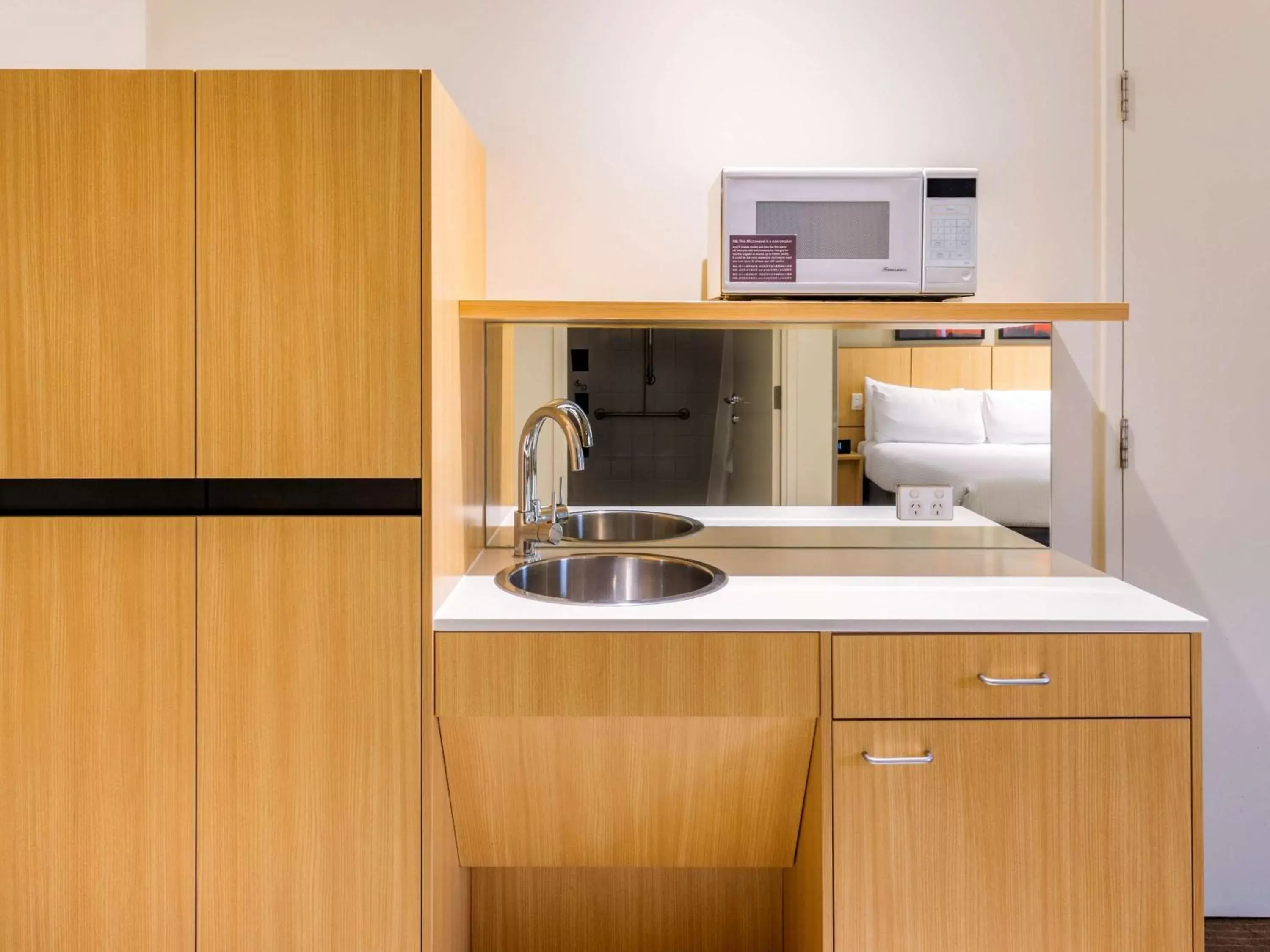 Bathroom, Kitchen/Kitchenette in Mercure Brisbane Garden City