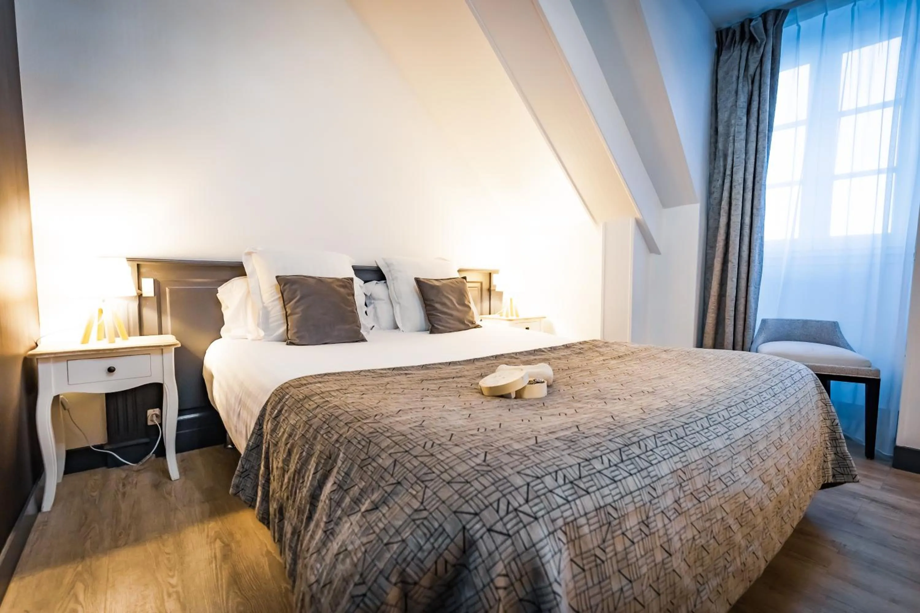 Bed in Grand Hôtel du Luxembourg & Spa