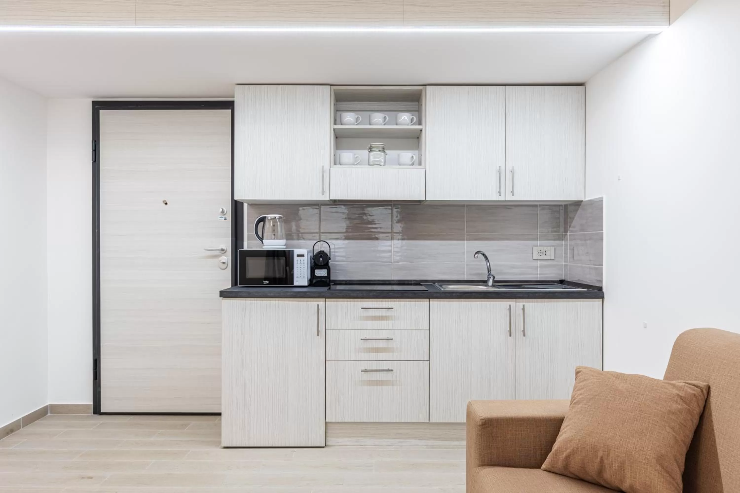 Kitchen or kitchenette in Solemar Sicilia - Multi Suite