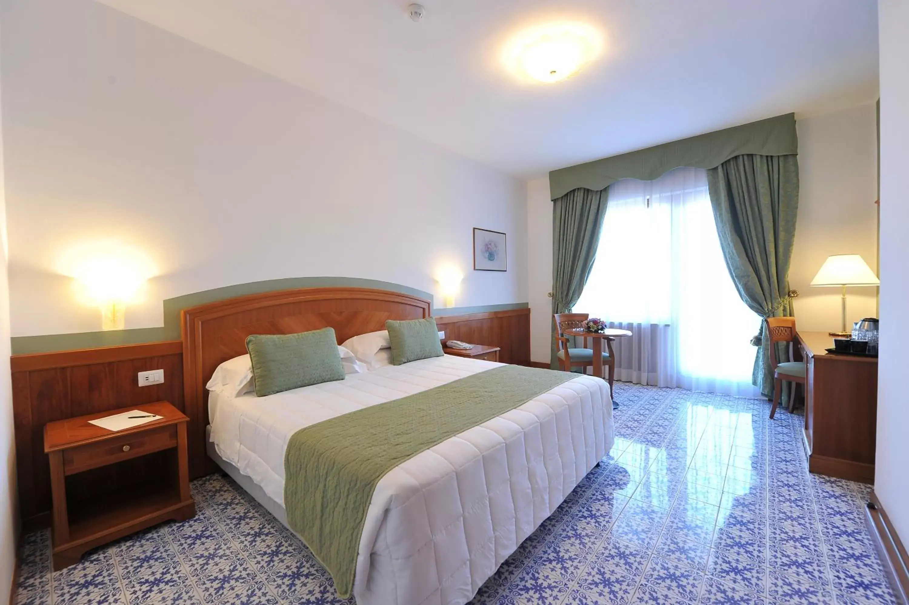 Bed in Grand Hotel Cesare Augusto