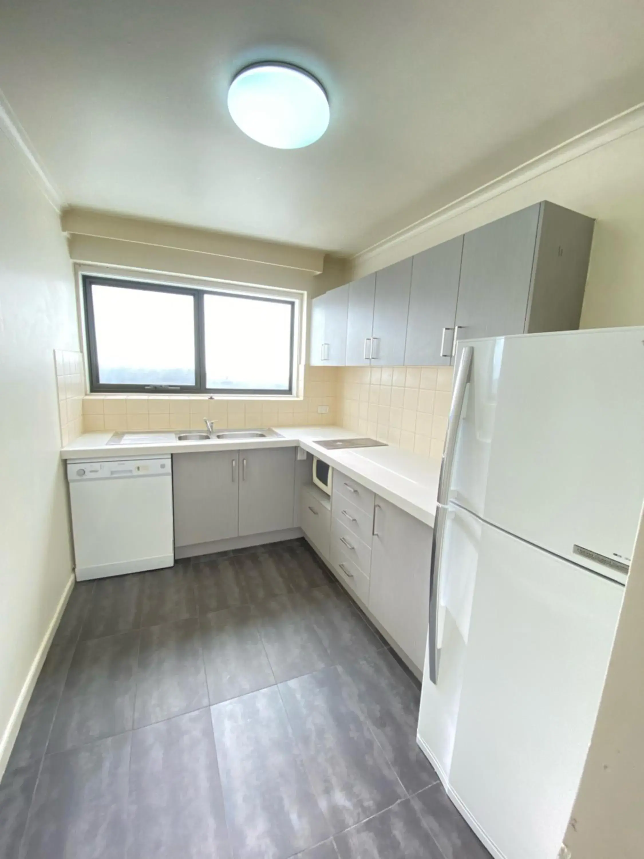 Kitchen or kitchenette, Kitchen/Kitchenette in City Edge East Melbourne Apartment Hotel